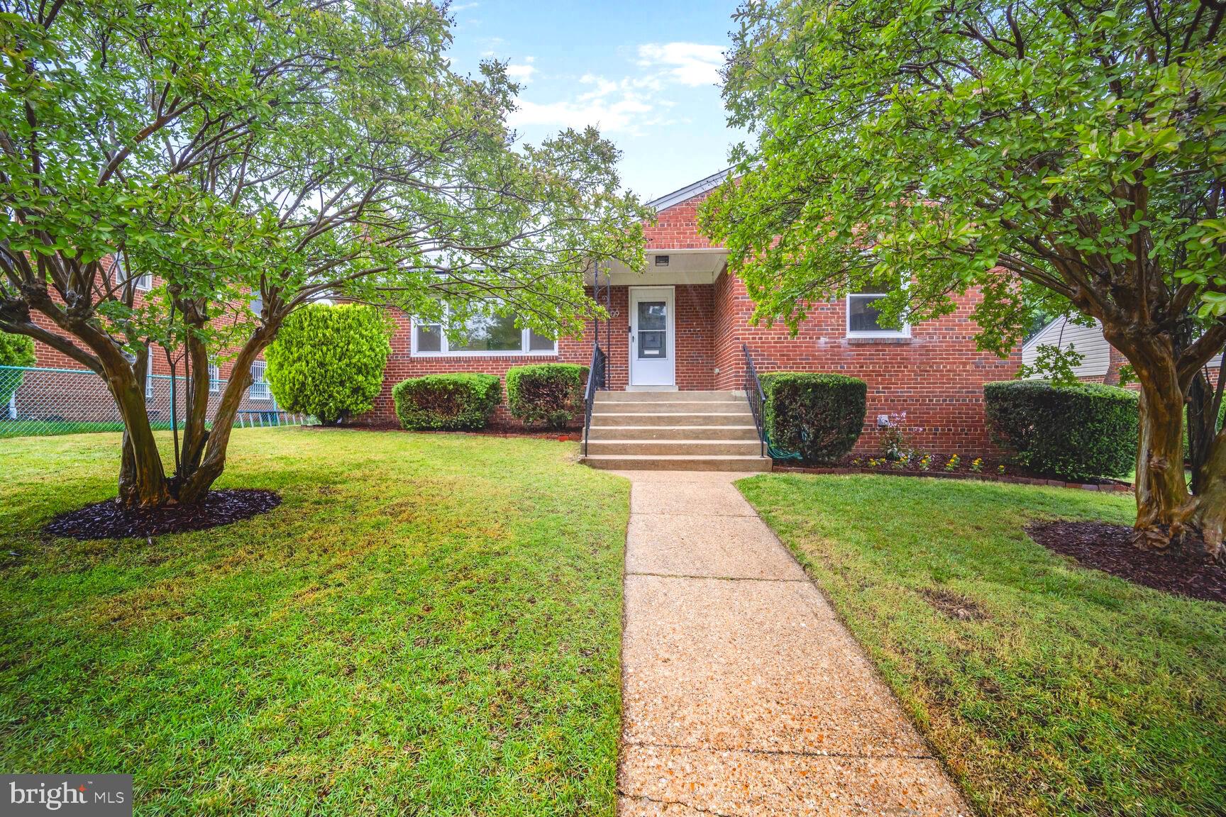 *This home is available for sale or minimum 12-month lease. Lease includes electricity.
Home is also for sale see - MLS# MDPG2151452
This beautiful 3-bedroom, 2.5 bath house is situated on a quiet, tree lined street, close to many nearby amenities. The main level includes a sunny living room with wood burning fireplace, recessed lighting, and an updated open layout kitchen with new upgrades. A bright and airy sunroom facing the backyard can serve as a home office, additional bedroom, or an exercise studio.  The newly refinished hardwood floors throughout the main floor showcases the generous semi-open living space with plenty of natural light, well sized bedrooms and plenty of closet space. The expansive, renovated lower level is ideal for an entertainment area or could be customized into a separate living quarters with its own entrance. The private backyard with patio, surrounded by trees and a well manicured lawn is the perfect place to host guests or enjoy some quiet time at the end of the day. Solar panels and brand new roof round out this ideal move-in ready house to call your home. Nearby amenities include walking distance to metro, nearby shopping and only two blocks from the DC line. Sign soon to be displayed on property.
