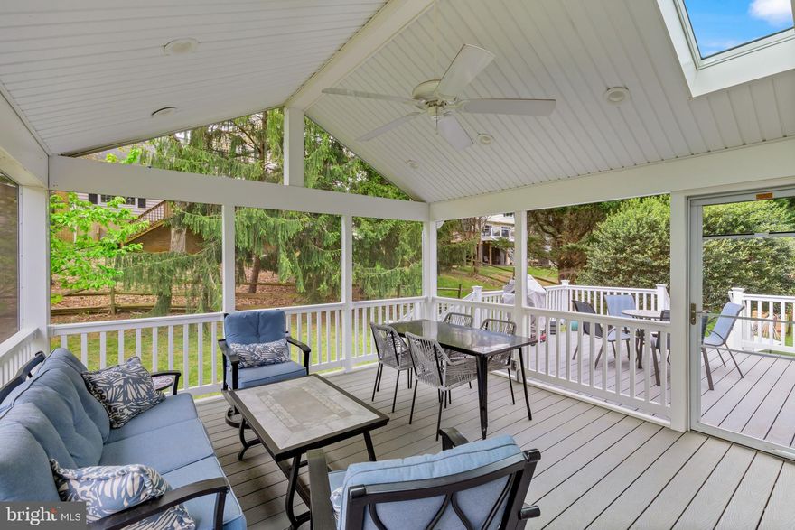 A home that truly extends your living space outdoors—featuring a stunning screened-in porch that feels like a second living room for most of the year. Thoughtfully designed for everyday comfort and easy entertaining, this home offers a seamless flow between indoor and outdoor spaces.

Located in the sought-after North Farm neighborhood, this 4-bedroom, 2.5-bath home sits on a quiet cul-de-sac and offers a well-balanced combination of open gathering areas and more private living spaces. The main level features cathedral ceilings in the living and dining rooms, creating a bright, airy feel filled with natural light throughout the day, while hardwood floors run throughout.

The dining area opens directly to the screened-in porch set on the deck, creating an easy connection between interior and exterior living. Just a few steps down from the kitchen, the family room provides a comfortable retreat, with large glass doors overlooking the backyard and offering direct access to a stone patio—ideal for additional seating, entertaining, or quiet outdoor moments.

The outdoor space is thoughtfully designed for enjoyment rather than upkeep, offering a more manageable yard complemented by mature cherry and peach trees that bear fruit each season—if you can get to them before the squirrels do.

The finished basement adds flexible recreation space, while the generously sized bedrooms provide comfort and functionality.

Conveniently located near neighborhood walking trails, the community pool, and the shopping and dining options throughout Montgomery County, with easy access to I-270 and I-495.