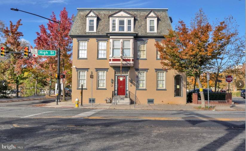 This mixed-use property for lease is in the borough of Pottstown at the corner of High and Evans Streets. Located in the downtown district, 343 High Street offers you the opportunity to be involved in the revitalization of the borough. Parking will never be an issue as this property is a corner lot and centered right between two parking lots, giving a wide range of flexibility for any type of business. Aside from plenty of parking, the walkability of this property opens you up to bars, restaurants, two beer gardens, salons, and organic food markets all within a few blocks. The borough of Pottstown works hard to encourage their businesses to be involved with all of the town activities, festivals, and parades, and this property gives any business the opportunity to be front and center for any and all of these community events! This two story property offers an inviting front foyer and old style staircase to welcome your patrons, with common conference room area. This layout does offer enough privacy for two separate businesses however the entire first floor can be leased for one business. A small kitchen and restroom are located on the first floor with the rear section dividing into three additional rooms. This layout offers the option for the installation of a commercial kitchen with a hood, including an independent entrance from the side street for efficient takeout ordering. There is an option to include outdoor seating for a restaurant or casual relaxing in the enclosed back yard area. The first floor is $1800 but lease price can vary depending on the amount of space that suits your needs. The second floor is available as well and listed separately.