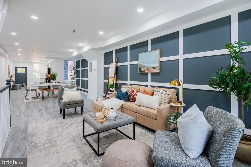 LIVE IN LUXURY! This designer home has it all as the builder left no stoned unturned this a BRAND NEW RENOVATION! Walk into this gorgeous 4 Bedroom 3 Bathroom open layout with a yard and large parking pad in the rear! Enjoy the designer finishes, modern floors and many windows flooding the home with natural light. The kitchen features stainless steel appliances, granite counter tops, designer finishes and an abundance of counter top space and cabinetry. There are 4 bedrooms with no shortage of closet space! The home also features an awesome walk out deck in the rear of the home plus a fully fenced in yard! Our team specializes in working with home buyers and we are happy to help you get set up with a mortgage and will ensure you take advantage of all the home buyer programs! This home is perfect for the Maryland Mortgage Program, LIVE Baltimore programs and many others! Set up your tour today!