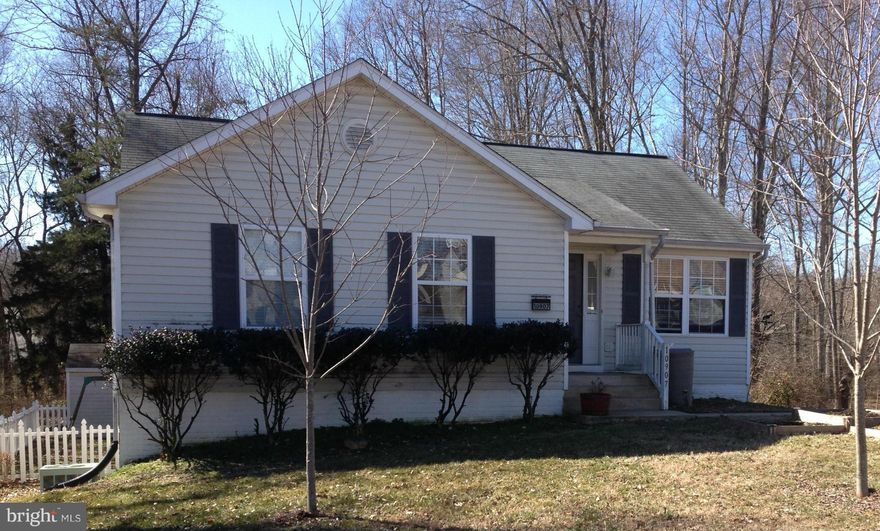 BANK APPROVED PRICE @ $170,000.  One level living with room to grow in great location.  Cathedral ceilings. Gas fireplace in living room and pellet stove in family room. Large basement walks out to patio. Basement is partially finished with half bath, family room.  Large deck. Large fenced level lot with lots of trees backing up to creek. Subject to third party approval, just 1 lender US Bank.