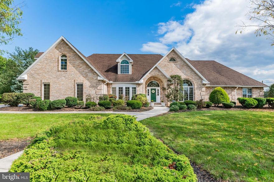 Welcome Home to this custom ranch situated on a spectacular .66 acre corner lot in desirable Meadowview Estates.  Designed by renowned luxury builder, Roland Builders, this supremely engineered home is not your cookie cutter rancher. Your all brick beauty offers over 4500+ finished sf and boasts an open floor plan featuring 4 bedrooms and 4 full baths!  This open, flowing plan provides the perfect backdrop for both everyday living and entertaining.  Whether you have young kids, mobility issues or just love a ranch style home, you’ll appreciate the ease of living in this one-floor home.  Your main floor offers 3 large bedrooms, 3 full baths and a spacious family room which connects directly to your eat-in kitchen.  A large covered porch just off the kitchen makes an ideal place to entertain guests with plenty of privacy and gorgeous views.  And speaking of guests, your generously sized dining room is a great place to host family and friends.  Rounding out the main floor are a versatile flex space that could be used as a playroom, office or sitting room as well as your laundry room which comes complete with a washer & dryer.  A massive bonus 4th bedroom and 4th full bath above the 3-car garage are ideal for guests, as a playroom or craft space or as a private suite. Your finished lower level featuring a pellet stove, offers endless possibilities for customization, whether you envision a home theater, gym, work-from-home business or additional living space. There is still plenty of storage and workshop space as well. This exceptional home is ideally located within walking distance to Mechanicsburg Schools and Fisher & Friendship Parks, blending luxury, comfort, and convenience in a serene and sought-after neighborhood. Don't miss the opportunity to make this extraordinary property yours!