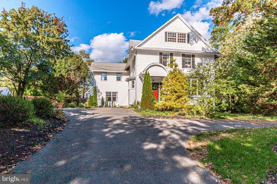This charming home, built-in 1925 has only had three owners. The current owners have expanded the home with a 2 story addition and have lived here since 1973 where they have held many wonderful memories since.   This home is close to Tysons Corner, The Mosiac District, and less than 2 miles to the WFC Metro, yet has the feel of country living on a private tree-lined Street. Home features high ceilings, beautiful moldings, original hardwood floors, and a pressed tin roof.  The main level has an updated eat-in kitchen with granite counters and stainless appliances.  off the kitchen is the large family room with French doors leading to the large beautifully landscaped patio that is perfect for dinners.  The formal dining room has French doors leading to the delightful sunroom perfect Mom's quiet space or kids' playroom and large sunny living room with fireplace.  The upper level includes a large primary bedroom with  bath with heated tile floors and three additional bedrooms all with hardwood floors and another full bath.  Attic has tons of possibilities- a teenager's ideal suite or private home office.  Lots of storage in the large unfinished basement.    This wonderful home is priced to sell!