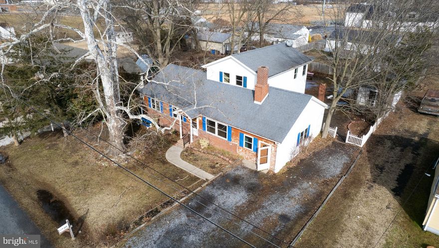 Discover space, flexibility, and opportunity at 1210 Stone Boundary Rd in Cambridge! This spacious 3-bedroom, 2-bath rancher with a versatile upstairs addition offers room to grow and endless potential — all priced under $300,000. The main level features a welcoming open-concept kitchen, living, and dining area ideal for everyday living and entertaining. Enjoy cozy evenings around the wood-burning fireplace or spread out with a second family room offering additional space for relaxing, hobbies, or gatherings.

Upstairs, a fully equipped in-law suite includes its own kitchen, bedroom, and full bath — perfect for multi-generational living, extended guests, or flexible living arrangements. While the home is ready for updates and personal touches, the layout, square footage, and functional design create an incredible opportunity to build equity. Outside, the quiet fenced backyard provides a private setting ideal for families, pets, gardening, or entertaining.

Sellers are very motivated and offering a $5,000 credit toward flooring — a fantastic opportunity to customize the home to your style while adding immediate value.

Conveniently located near local shopping, dining, waterfront attractions, and commuter routes, this property combines space, versatility, and affordability rarely found at this price point. Bring your vision and make it your own!