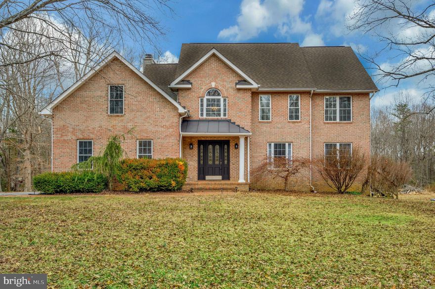 Welcome to your dream home! Nestled on a generous 3.5-acre lot, this stunning Colonial-style residence offers a perfect blend of modern comfort and timeless charm. Built in 1995 and thoughtfully renovated top to bottom  in 2022, this property is in excellent condition and ready for you to move in and make it your own. As you step inside, you’ll be greeted by a warm and inviting atmosphere, enhanced by a traditional floor plan that seamlessly connects the living spaces. The kitchen is equipped with essential appliances, including an electric oven/range, refrigerator, dishwasher, and convenient washer and dryer, making daily living a breeze. With five well-appointed bedrooms and three and a half bathrooms, there’s ample space for everyone. The luxurious master suite offers a serene retreat, while the additional bedrooms provide flexibility for guests, a home office, or a playroom. Each bathroom has been designed with comfort in mind, ensuring a relaxing experience for all. The fully finished basement adds even more living space, featuring a daylight design that invites natural light and offers a walkout entrance to the backyard. This versatile area can serve as a recreation room, home gym, or additional storage, catering to your lifestyle needs. Step outside to discover the beauty of your surroundings. The property backs to lush trees, providing a peaceful and private setting, while the cleared areas offer plenty of space for outdoor activities or gardening. Enjoy serene views of your garden and lawn from the deck, where you can unwind and soak in the tranquility of nature. Parking is a breeze with an attached side-entry garage that accommodates two vehicles, along with additional driveway space for guests. This home is not just a place to live; it’s a sanctuary where you can create lasting memories. With its prime location, modern amenities, and beautiful lot features, this property is a rare find. Don’t miss the opportunity to make this inviting residence your own. Schedule a showing today and experience the warmth and charm that awaits you!