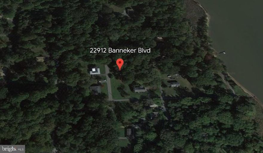 This parcel of land in Aquasco, MD, offers a unique opportunity for investors and developers alike. Boasting a prime location, the property provides a perfect blend of tranquility and accessibility. Surrounded by lush greenery and picturesque scenery, it presents an ideal escape from the city's hustle and bustle while remaining conveniently close to major roads and essential amenities. With its generous size, the land holds significant potential for development. Whether envisioning a luxurious residential estate, a charming farmstead, or recreational facilities, the possibilities are endless. This parcel can be joined with the 23216 Benjamin Banneker Blvd for a grand total of 13,966 SF.