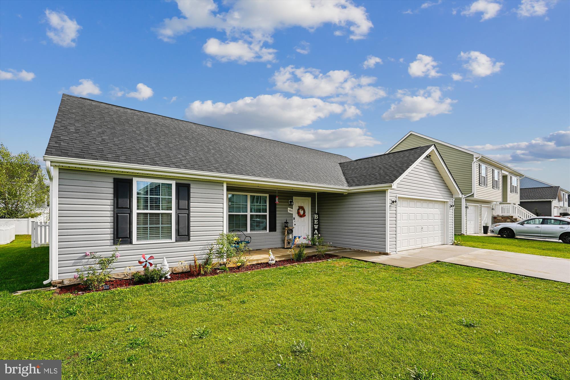 Welcome to this inviting 3-bedroom, 2-bath rancher in the highly sought-after Red Hill subdivision. Move right in and enjoy the thoughtful upgrades this home has to offer. The open-concept design is enhanced with luxury vinyl plank flooring throughout the main living areas, creating a stylish and durable foundation that seamlessly connects the living, dining, and kitchen spaces.
The kitchen shines with granite countertops, stainless steel appliances, and ample cabinetry—making it a beautiful and functional centerpiece of the home.
Set on a slab foundation, this home provides the ease of true single-level living. A spacious 2-car garage and fully fenced backyard with low-maintenance white vinyl fencing add convenience and outdoor enjoyment.
Ideally located near Hedgesville schools, medical facilities, shopping, and dining, this property blends everyday comforts with commuter-friendly access to major routes. All that’s left to do is move in and make it your own.