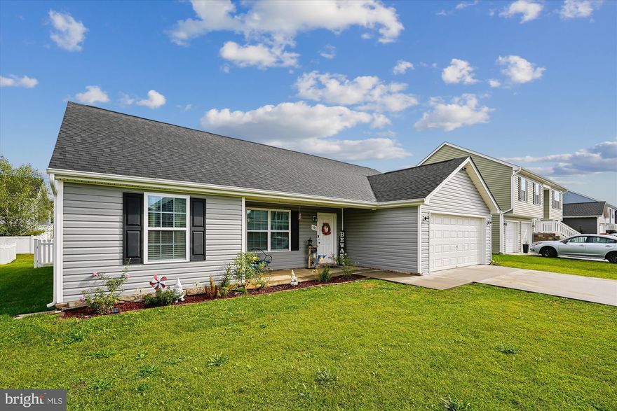 Welcome to this inviting 3-bedroom, 2-bath rancher in the highly sought-after Red Hill subdivision. Move right in and enjoy the thoughtful upgrades this home has to offer. The open-concept design is enhanced with luxury vinyl plank flooring throughout the main living areas, creating a stylish and durable foundation that seamlessly connects the living, dining, and kitchen spaces.
The kitchen shines with granite countertops, stainless steel appliances, and ample cabinetry—making it a beautiful and functional centerpiece of the home.
Set on a slab foundation, this home provides the ease of true single-level living. A spacious 2-car garage and fully fenced backyard with low-maintenance white vinyl fencing add convenience and outdoor enjoyment.
Ideally located near Hedgesville schools, medical facilities, shopping, and dining, this property blends everyday comforts with commuter-friendly access to major routes. All that’s left to do is move in and make it your own.