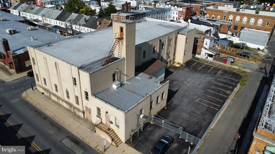 Large warehouse/office flex space available for lease. Approximately 2000 square foot office space consists of kitchen, one 1/2 bath, 1 full bath, lobby area and 8 private offices/conference rooms. There is approximately 15,411 Warehouse/manufacturing space on the first and second floors plus a 8,116 square foot basement area. All floors are serviced by a freight elevator. All areas are serviced by a sprinkler system. Entire property is fenced providing secure outside storage. Building also has loading dock and covered drive in bay to a facilitate loading and unloading smaller trucks. Entire space is available. Owner will consider making modifications for a long term credit worthy tenant. Location provides easy access to Center City Allentown and all major routes. Would make great warehouse distribution facility, light manufacturing space or for contractor.