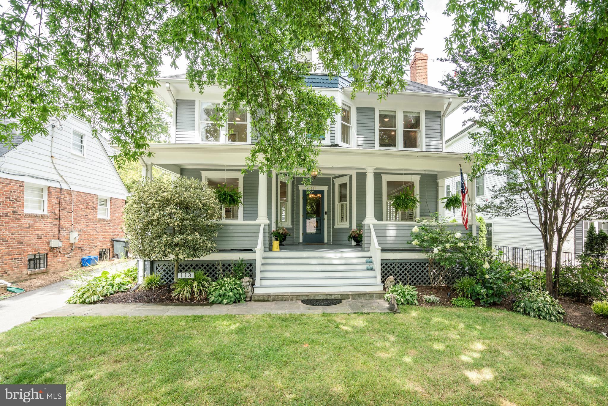 Built in 1896 this charming front porch home in Chevy Chase Martins Additions offers beautiful renovations and updates throughout. The front hall boasts the high ceilings and warmth for welcoming friends and family. The open new kitchen has a large island with seating as well as a windowed banquette for gathering around a table. The exposed brick wall features the Bertazzoni Italian gas stove/oven, granite counters, and farm sink. The mushroom wood ceiling beams accent the lighted cabinets offering plenty of storage. There is also a large separate Dining Room full of historic charm with a grand fireplace featuring original architectural detail, pocket door, and many windows . The large living room area extends from the front of the home flowing through to the back porch and grill area with steps to a brick patio.
The primary suite on the second level has been renovated to add a gas fireplace and a large walk in closet off of the private bathroom. There is another large bedroom with 2 large closets and office space. There is a hall full bath with a tub/shower. The 3rd bedroom on the second level has good closet space as well. The smallest of the 4 bedrooms on the second level has 3 large windows and also makes a fabulous office. The Fifth Bedroom is located on the 3rd level of the home with it's own full bath with a tub/shower. There is also additional unfinished storage space on this third floor. The Lower Level of the home has also been renovated to add a full bathroom offering a large shower. There is a tv/playroom with space for gym equipment. There is a workshop area in the unfinished space. There is an additional refrigerator near the back door lower level exit and stairs.
The property is beautifully landscaped for privacy and has a small koi pond. The oversized newer garage also provides storage, a workshop space. East of Brookville Road on Quincy offers the quietest section of this Chevy Chase neighborhood with no cut through traffic. The front porch complete with porch swing has an outdoor living space to enjoy this quiet street's sidewalk community.
This 5 bedroom, 4 and a half bath home has been renovated to preserve the unique historic charm but add the modern updates for functionality, storage and entertaining.
