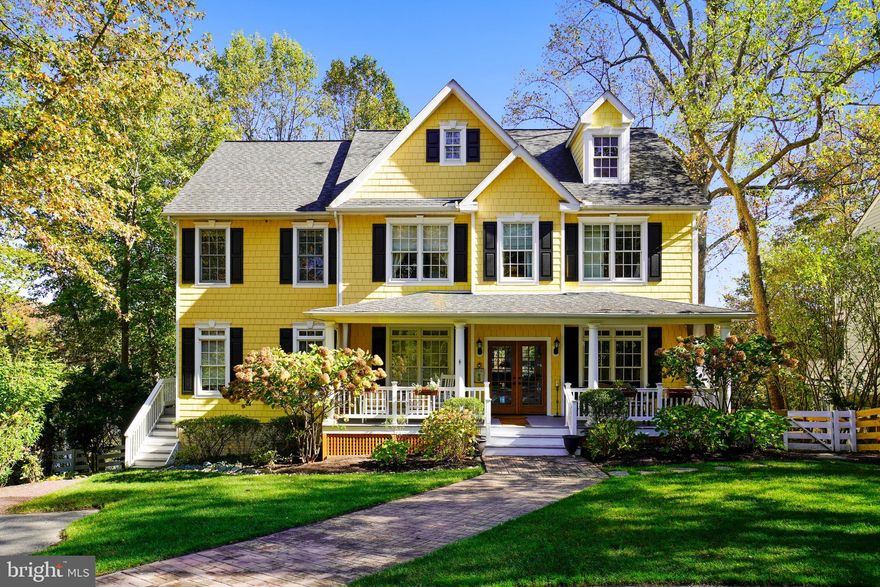 $50,000 Price Reduction, Don't miss the opportunity to make this truly one of a kind home yours!!  This spectacular waterfront Southern  Colonial with its welcoming front porch and multiple decks  has so much to offer!  5 bedrooms, 5 & 1/2 baths, an Au-Pair suite with separate entrance, fully finished lower level complete with a  2nd full kitchen, and a 48X28 attic ready to be finished. The main level features an open floor plan with spectacular water views, a chefs kitchen with custom cabinetry, granite counter-tops, a 4x8 center island with storage and commercial grade appliances.   There is a main level bedroom with en-suite bath, main living room with remote gas fireplace, hardwood flooring throughout, extensive moldings including crown molding, chair rails, decorative shadow boxing, and tray ceilings.  The 2nd floor offers a relaxing waterfront master suite with private balcony, luxurious master bath with soaking tub and a huge walk-in closet.  There is another bedroom on this level with en-suite bath, both bedrooms include decorative moldings and wainscoting.  The finished lower level includes a spacious family room, second kitchen,  4th bedroom, full bath and a bonus room, currently used as a bedroom.  The Au-Pair suite is located off of the main level kitchen with its own entrance and staircase, and features a kitchenette, living area, 5th bedroom, a full bath and beautiful water views. Off of the main level there is a large covered deck with water views out to the Chesapeake Bay.  The lower level  walks out to a large partially covered flagstone patio overlooking the meticulously maintained perennial gardens as well as one the most picturesque creeks in Annapolis.  This home is located across the creek from a protected forest area, guaranteeing you will never see anything but trees and wildlife while enjoying your morning coffee. Your own private  pier,+ kayak launch,  an  in ground irrigation system, and a brand new full  house generator system/brand new duel fuel double zone HVAC.  The home is located just 4.5 miles from  downtown Historic Annapolis, and can also  boast as a very well proven  and successful  vacation rental property as seen on vrbo.   The Seller may be open to negotiation of a VR turn key purchase complete with some furnishings and other amenities insuring a successful transition/investment.  Community boat ramp located just a minute from the home!