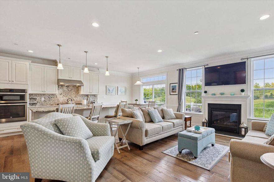 Welcome to The Oaks at Lafayette Hill, a much sought after Toll Brothers Community! 2150 Julia Drive is a beautiful 3 bedroom, 2 1/2 bath home located on a gorgeous lot with an open view from the deck.  Upon entering you will notice the stunning hardwood floors and the open staircase. To the left is a flex room which can be used as a formal dining room or first floor office.  The gourmet kitchen offers an upgraded stove and hood, granite countertops, and a large kitchen island for entertaining along with an eat-in kitchen. The open concept adds additional space with a family room and centered fireplace for relaxing or watching TV. Upstairs you will find the master bedroom which boasts  his and her walk in closets and a walk-in shower, as well as two additional bedrooms and bath. The laundry area is conveniently located on the second floor. The walk-out basement is fully finished for additional entertaining. At the end of the day relax on the extended deck and enjoy the peaceful scenery. This home offers low maintenance with landscaping and snow removal. It is a prime location, just minutes away from a host of great Conshohocken restaurants, with convenient access to Route 76, 476, and the PA Turnpike. You have to see this home,  it will not last!