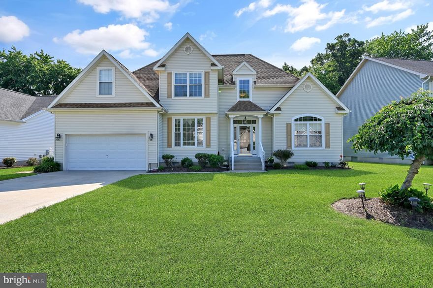 Meticulously maintained 4-bedroom, 2.5-bath home located in the desirable Oyster Harbour community in West Ocean City! This spacious and thoughtfully designed residence offers a blend of comfort and functionality, starting with a 2-car attached garage and inviting curb appeal. Step inside to a bright and airy living room featuring cathedral ceilings, perfect for entertaining or relaxing. The large kitchen boasts an island and ample cabinet space, opening to a formal dining room ideal for gatherings. The first-floor primary suite provides a peaceful retreat with a walk-in closet and a luxurious bathroom featuring a soaking tub, walk-in shower, and dual vanity sinks. Upstairs you'll find two generously sized bedrooms, a full bathroom, and an additional bedroom currently used as a second living room or flex space. Enjoy the outdoors from the comfort of your screened-in back porch. A dedicated utility room offers extra storage with upper cabinets above the washer and dryer. Located in a well-maintained community that includes trash and snow removal, lawn care, and a community pool — offering low-maintenance living with resort-style amenities. This home truly has it all!