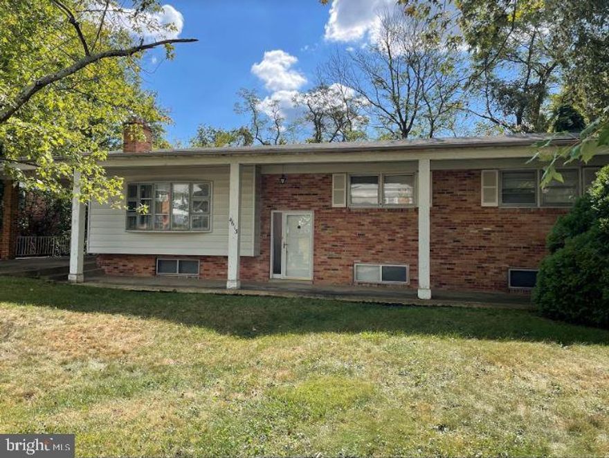 4 Bedroom 3 bath split foyer brick home in Woodberry Forest. Walk up into a light and bright living room with cozy fireplace and accent wood paneled wall. Spacious eat in kitchen provides plenty of counter space, cabinet space and door to back yard. 3 bedrooms and 2 full baths complete the level. The lower level is perfect for additional living space or recroom and  features statement brick fireplace. A full bed and bath are perfect for guests. French doors take you to the back yard. Prime location with ample parking, ten minutes from MGM, National Harbor and the Tangier Shopping Outlets and minutes from 495.