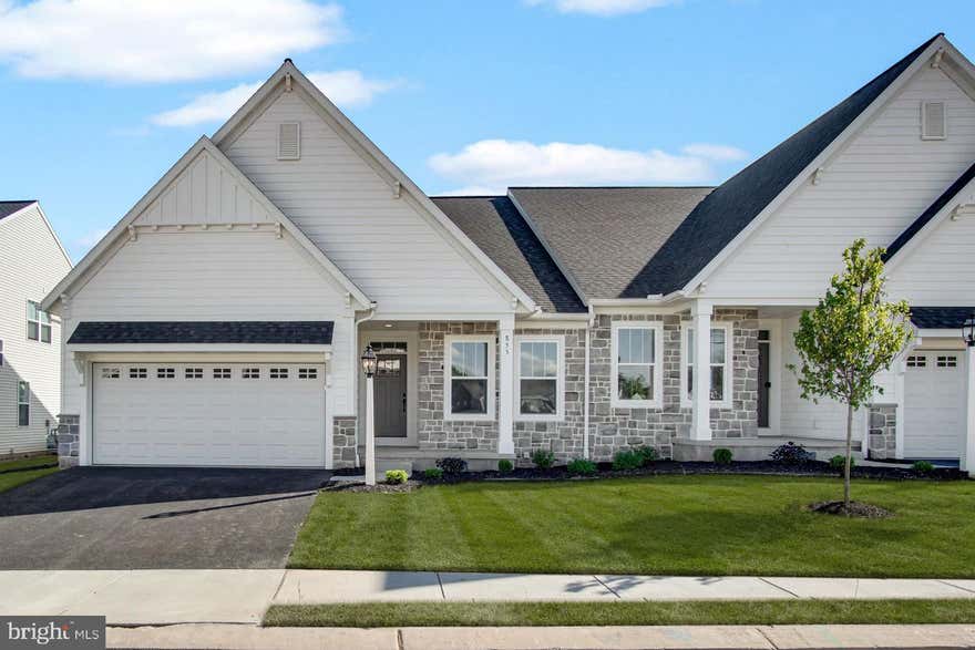Welcome to 855 Shadowbrooke Drive!

The photos being shown are just temporary as this units model isn't ready just yet. This home will be ready for purchase  4/17/2026

This beautifully crafted, one-story Wynn model by Garman Builders offers 2 bedrooms and 2 full baths, providing 1,713 sq. ft. of stylish living space. Relax outdoors with the built-in covered patio, ideal for enjoying the fresh air in any season. Inside, the cozy interior fireplace adds warmth and character to the living area. With upgrades throughout and thoughtful design, this home is perfect for comfortable living. Situated in York County’s premier 55+ community, it's the perfect place to enjoy a serene and vibrant lifestyle. Come see how this home can be your ideal new retreat!