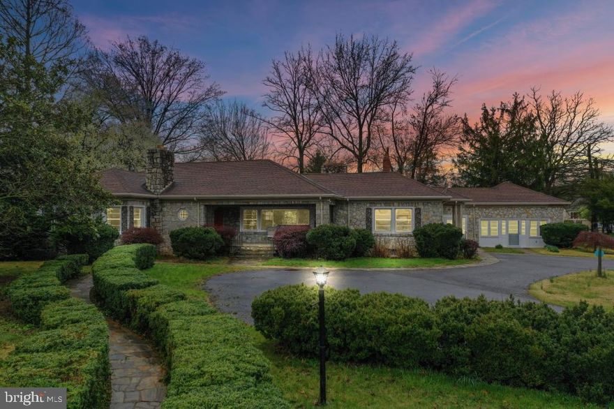 This 4 BR, 2 & A Half Bath Beautiful solid stone manor home boasts plenty of living space and is renovated to impress. This home features all over sized rooms with refinished hardwood flooring, 4 fireplaces, and custom sized replacement windows providing magnificent views of the 1.42 landscaped acres. Once past the large covered front porch, you'll enter the main wing through the carved wood front door to a spacious foyer that also has unique slate floors and vintage wall murals. Also in the main wing is an expansive living room, dining room and kitchen. The kitchen is surrounded by beautiful floor to ceiling cabinets, a bonus double door pantry, all new appliances, ceramic tile floors and a bright breakfast nook. The glass cooktop is crowned by a gorgeous stainless steel and glass exhaust fan with light or you can cook with the double wall oven. The dining room features stately crown , chair and shadow-box molding. A pocket door is cleverly tucked away between the dining room and kitchen. The "north-east" wing of the home features a Florida room, with a separate bedroom and living/office space that could easily accommodate a home office, with separate entrance. The "south-west" wing of the house features a master bedroom suite with fireplace, hardwood floors, master bath and 2 walk-in closets. Additional 2 bedrooms are sizable and each offers walk-in closets. Hall bath also features extra storage, granite counters and ceramic flooring. The basement consists of partially finished space and a fireplace. Extensive water-proofing has been installed with French drain systems. Owner has a real estate license in MD.