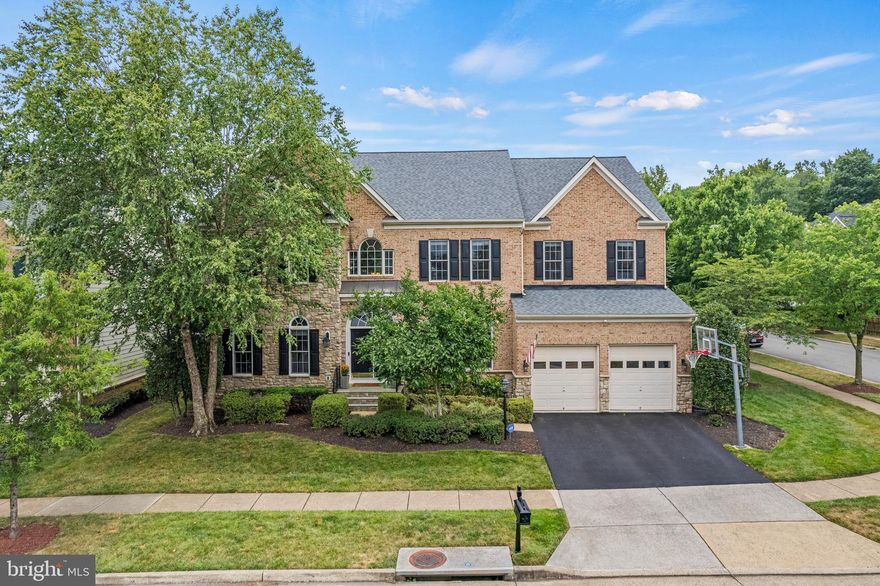 Don’t miss out on this gorgeous stone-faced single-family home with over 6100 square feet located in the quiet River Oaks section of Lansdowne on the Potomac. This home has it all and is move-in ready with no detail left untouched. This house features a two-story foyer that opens to two-story family room with electric shades, custom lantern chandeliers and new wide plank wood floors through the main level (2023). The two-story stone fireplace in the family room features a gorgeous new custom wood mantle. Brand new roof (2022), and two new HVAC units (2021 and 2023). The kitchen features upgraded maple cabinets with sleek Calcutta Quartz counters and subway tile backsplash with upgraded stainless-steel appliances (2018). Enjoy the airy, beautiful custom porch off the kitchen that opens to backyard w/flagstone patio, custom landscaping and irrigation. This home features three finished levels with a total of 6BR’s and 5 ½ baths. The upper level has 4 BR's and 3 full baths, the main level has 1 BR with full bath (that also could be used as an office) and 1 BR on lower level with full bath. The lower level includes an updated bar area (2024), new LVF flooring (2018), media room, workout room and tons of storage!  The garage has extra-long bays that can accommodate extra storage for your bikes/snowblowers and lawnmower.  The sought-after Lansdowne community provides topnotch amenities, including a 25-meter heated indoor lap pool open year-round, two outdoor pools - one of which at the Potomac Club featuring a resort-style pool with beach-entry, baby pool, three mushroom water fountains, bubble fountains, and a sand volleyball court. Amenities also include walking trails, newly renovated playgrounds, three tennis courts, pickleball courts, new 3600 sq ft state of the art fitness center, and a clubhouse with a meeting room, ballroom, business center, and game room – all of which are currently under major renovation and projected to be finished by August 2024. The HOA fee includes Xfinity high-speed internet and cable service. LOCATION, LOCATION, LOCATION: The home is surrounded by nature, while only minutes from Leesburg Outlet Mall, Wegmans, Whole Foods, Costco, One Loudoun, Dulles Town Center, Top Golf, and various local restaurants, movie theaters, and shops. The home offers easy access to several major transit routes like Route 7 and 28, the Metro, and Dulles Airport. Nature, community, recreation, commerce and a peaceful lifestyle - don’t miss this opportunity to have it all! Sat and Sun 1-3.