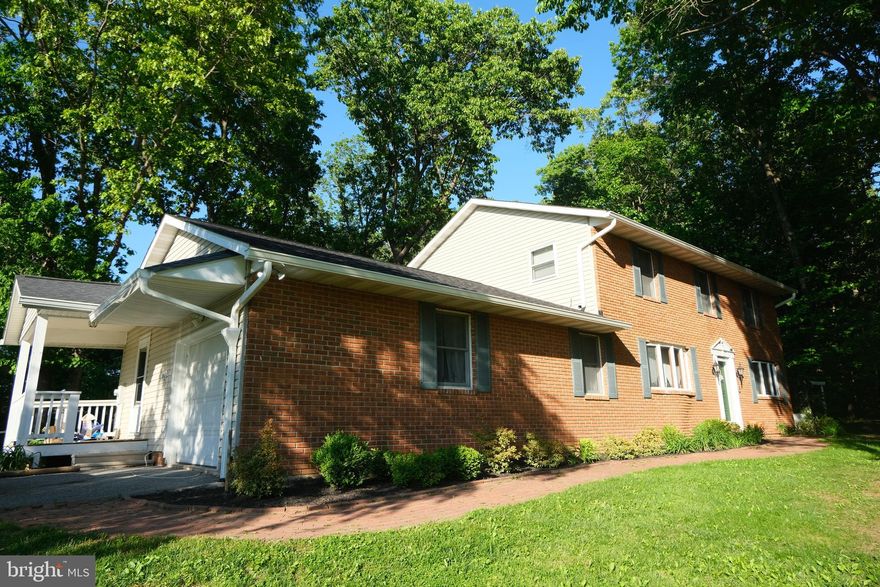 Come see your new home today! Nestled in the heart of Woodbine, this beautifully maintained 5-bedroom, 3.5-bath home sits on a peaceful 1-acre lot offering the perfect blend of comfort, flexibility, and country charm. Featuring a renovated kitchen, brand-new roof, and new LVP flooring in the basement, this move-in ready home also includes a private in-law suite with a convenient kitchenette — ideal for multigenerational living, guests, or added rental potential. Enjoy tranquil country living with plenty of space to relax, entertain, and unwind.