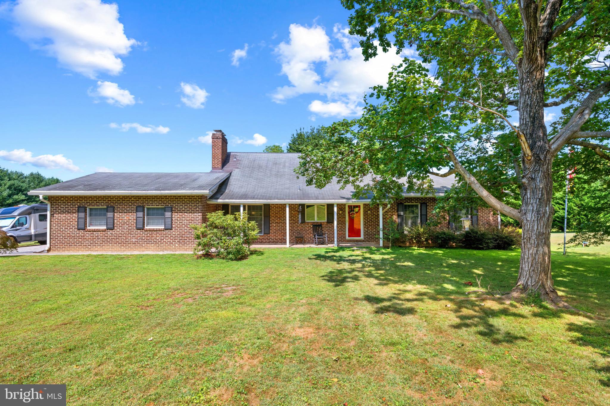 Desired Finksburg location with just few homes on a non through street. Main level living with added bonus of upper level flex space, office/craft room and a full bath, also a walk in storage area that runs the front length of home. Spacious eat in country kitchen, gas cooking and a wall length brick hearth and wood burning fireplace. Living room and dining room over look the private fenced back yard. The sunroom off kitchen boasts brick floor, ceiling fan and leads to back deck - perfect to host parties and/or large family gatherings. Need room for cars or a workshop? You will LOVE the detached 2 car garage complete with heat and electric. This turn key home is sure to please. Updates include: New Roof to be installed before settlement, HVAC inside and out (2022), totally updated full bath on main level that was literally finished this week, hot water heater2025, fresh paint, new LVP flooring on main and lower level. Can't forget to mention this home is equipped with a whole house generator. Sellers are retiring south and need an offer!!!