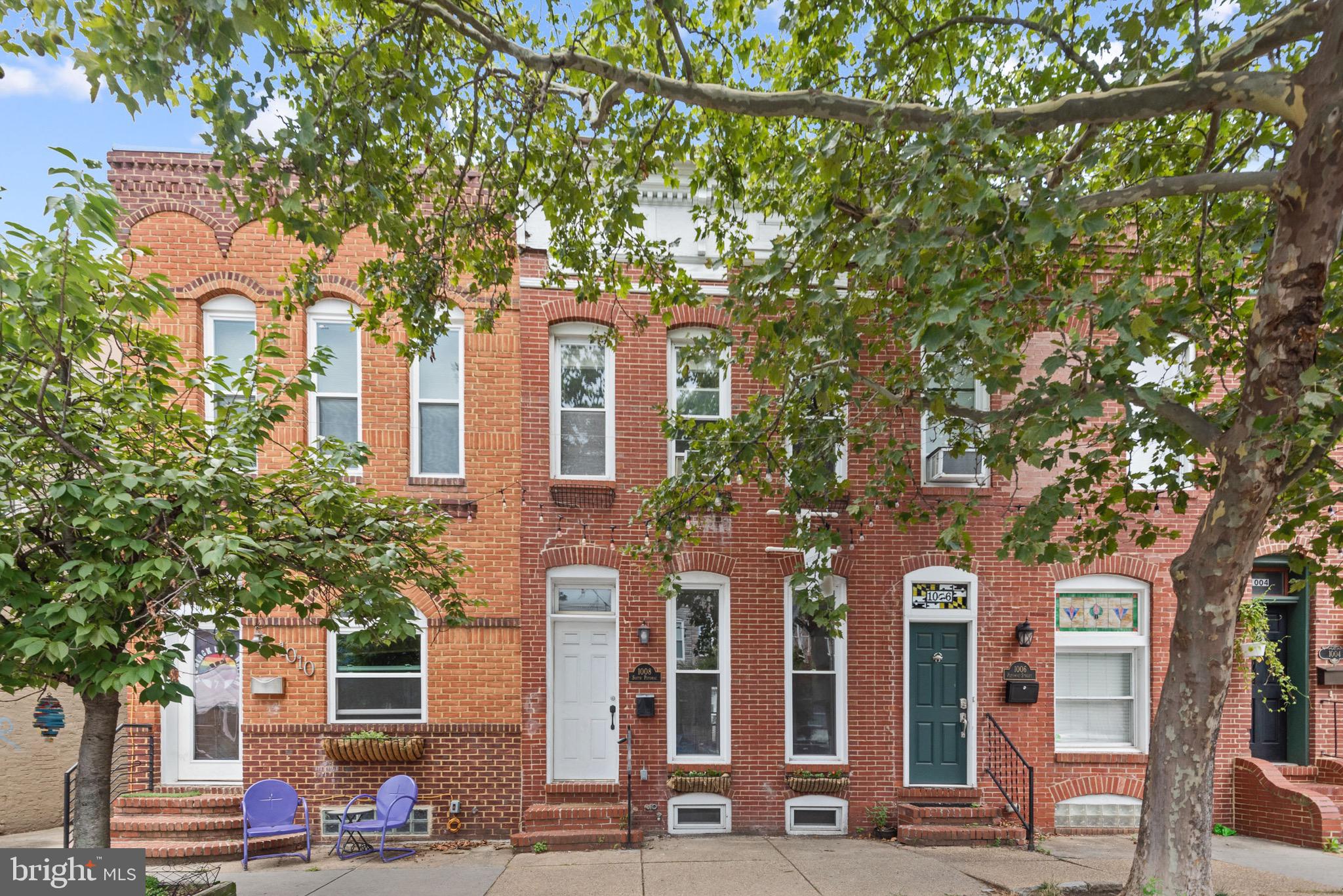 Location, location, location! Live near all that Canton has to offer! This charming townhome is 14 feet wide and offers 2200 square feet of living space, 3 bedrooms and 3.5 baths. Fully finished basement has bedroom and full bath, washer/dryer. Features original hardwood floors throughout, beautiful exposed brick, built in shelves, Custom Cherry kitchen cabinetry and stainless appliances. Kitchen opens to an outside patio area perfect for enjoying a meal alfresco! Or relax upstairs on the rooftop deck!