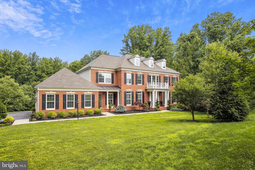 This gorgeous private house is waiting for you to move in. The lot backs to trees and is protected from any future building. The property has 5 bedrooms with an open floorplan that allows for spectacular views of the beautiful large backyard and nature. The large open kitchen with an  island will be the perfect place for cookie making and dinner preparation. Don't worry about the crumbs on the floor, just sweep them into the central vaccum port in the kitchen baseboard. The house has all the amenities you will need to call this beautiful property home.The private driveway will lead you to the three-car garage overlooking a beautiful open lot. Once inside, the gleaming wood floors, a two-story foyer and open feel will quickly give you a feeling of tranquility. On the second level is where you will find the spacious owner's suite with a fireplace and great en suite with a large walk in closet. The second level has three additional bedrooms and two bathrooms. The lower level is where you may want to spend time entertaining and for fun. In addition to a private viewing room there is another bedroom and full bathroom on the lower level. The smart lights are sure to help set any mood you would like. This property is waiting for you!