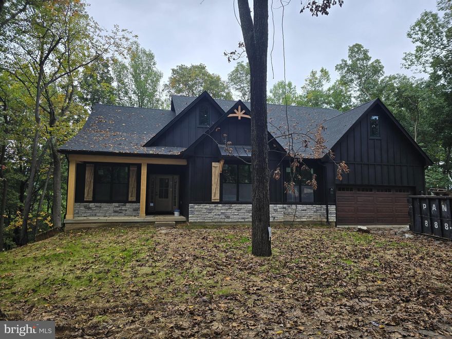 November 4th delivery for this new home. 1.17 +/- wooded acres situated in Lake Forest Estates! Well established community that offers the perfect amenities for residents and your guests. Exclusivity for you and the community members sharing the 10 acre lake, pond, pavilion with picnic area with basketball court, fishing dock, views of the Shenandoah Valley, access to the Appalachian Trail and so much more. Your home will fit perfectly and will include the following: 4 bedrooms with 3.5 baths ranch craftsman style home. Quality construction nicely upgraded with full kitchen appliance package, granite, luxury vinyl plank flooring, upgraded cabinets, vaulted ceilings & more. Full unfinished basement. Close to amenities. Pictures are of similar finishes with various upgrades.