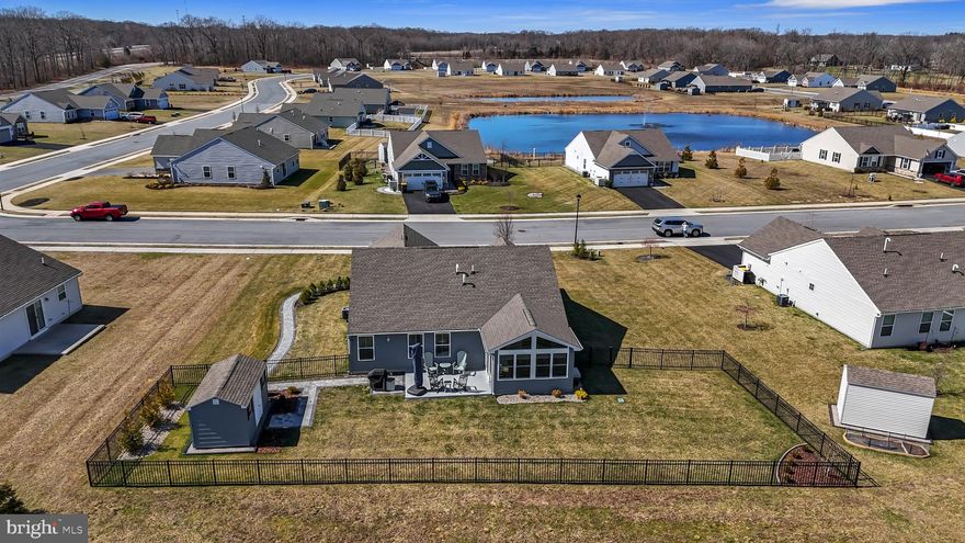 Looking for the Perfect 55+ Active Adult Home? Look No Further.

Located in desirable Community of Verona Woods, this beautifully upgraded Grand Bahama Model offers over $100,000 in post-settlement upgrades and is perfectly situated on a spacious lot with excellent spacing between homes—something today’s buyers truly appreciate.

One of the standout features of this community is the ability to personalize your outdoor space, allowing for fencing, sheds, and custom landscaping, giving homeowners the freedom to create their own private retreat.

This home features exceptional curb appeal with a stone front exterior, a fenced yard, professional landscaping, and a custom shed. The outdoor living space includes paver patios, a beautifully finished epoxy patio area, irrigation system, and thoughtfully designed hardscaping and walkways.

Inside, the home offers a bright and open layout with Luxury Vinyl Plank flooring throughout and numerous custom upgrades. The kitchen is designed for both function and style with quartz countertops, a large island, and a recently added wine and coffee bar, perfect for entertaining or everyday enjoyment.

Additional highlights include:

• Four-season room with its own heating and air conditioning for year-round comfort
• All gas appliances and on-demand hot water heater
• Custom blinds throughout the home
• Convenient garage organizers for extra storage
• Large main suite with walk-in closet featuring custom closet organizers
• Third bedroom with a Murphy bed, ideal for guests or a home office

With extensive landscaping, hardscaping, and thoughtful upgrades throughout, this home offers a rare opportunity to own a truly move-in-ready 55+ property in Kent County.

Come see this beautifully appointed home and experience the comfort and lifestyle it offers.