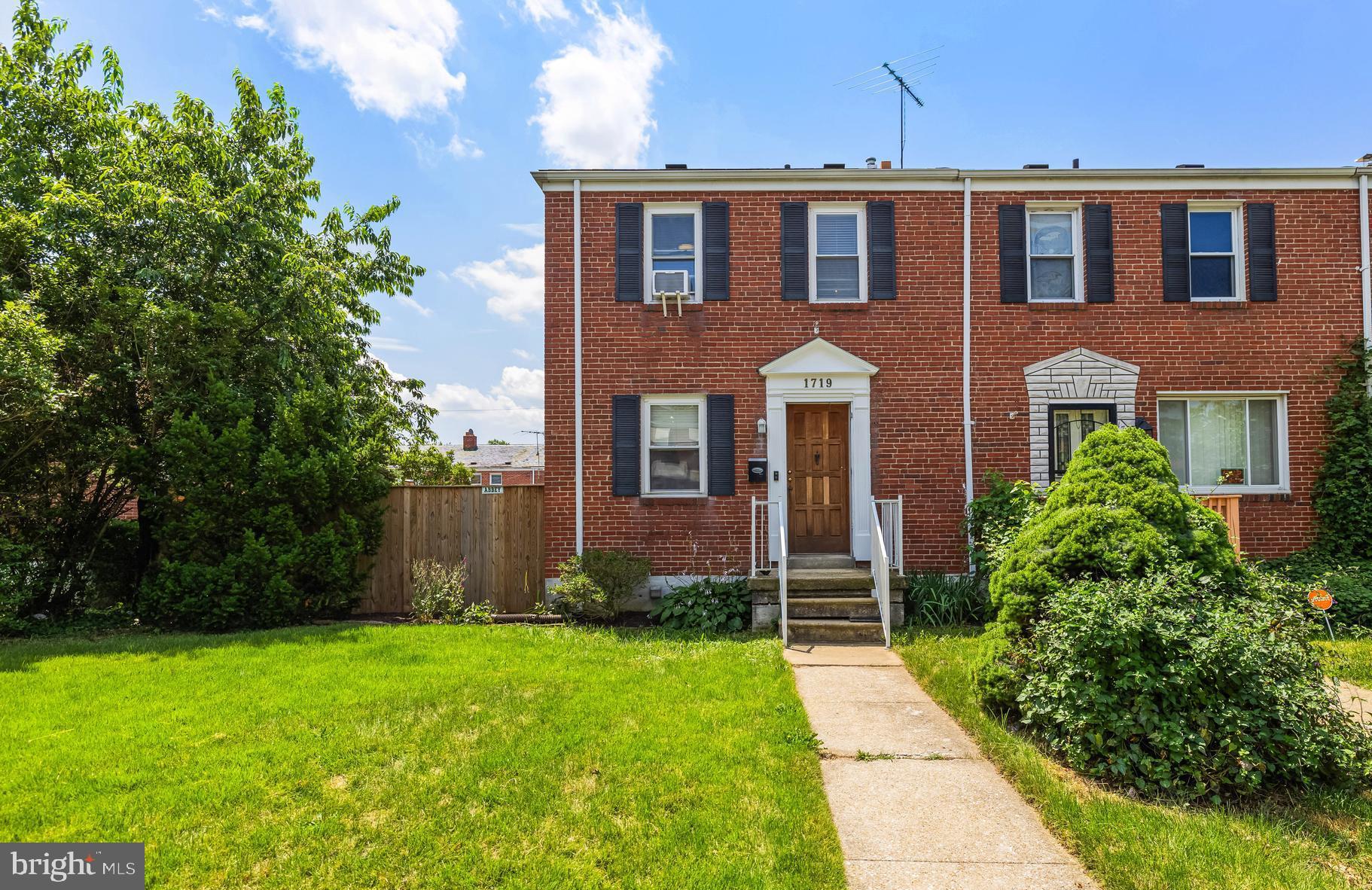 End unit brick townhouse offering 3 bedrooms and 2 full bathrooms, including a finished basement with a full bath, spacious family room, and bonus room—perfect for a home office or guest space. Hardwood floors throughout the main and upper levels, and fresh paint throughout the entire home. The main level features a living room, dining room, kitchen, and a screened-in porch with skylights—ideal for entertaining. Step out to the fully fenced-in private backyard with parking for two cars. Conveniently located near major shopping and highways.