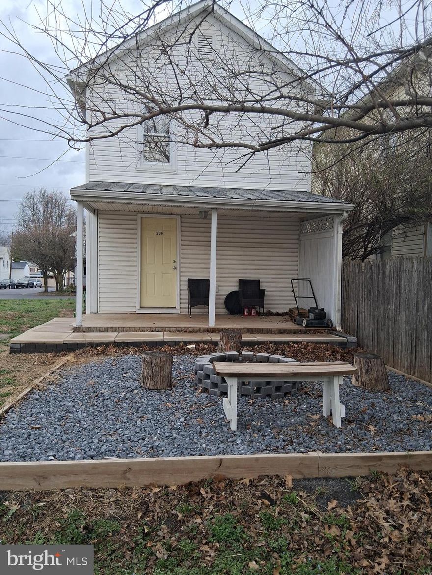 1910 charm on 110'x20'  lot. Country eat in kitchen with stainless steel appliances opens to a covered back porch with fire pit. The living room is in the front of the house adjoining the kitchen. There' a stairway to the 2nd level between the living room and dining room. Upstairs there are 2 bedrooms that open to a large hallway where the bathroom can be accessed by both bedrooms. Seller will sell house on lot B only for 175,000. House on lot B and additional lot C can be bought together for 189,900 with closing cost help. If buyer does not ask for closing cost help both can be bought for 185,000. Listing Broker is Chris Hild with Realty FC not Crum. System won't take it. House has been recently painted so please wear the booties laying inside the kitchen floor.