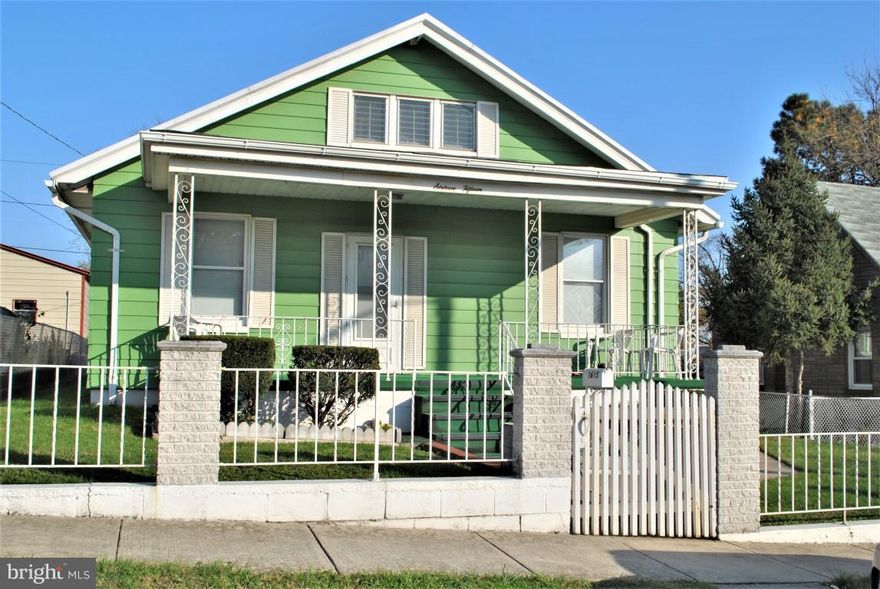 One owner home perfect for someone who wants to live in and renovate one room at a time. This well kept homefeatures a large front porch, open concept living area, eat-in kitchen plus separate dining room and nice enclosed porch in the back. Home has a fully floored attic for storage or game room. The yard is large and fenced in with a one car garage.  Just bring your decorating touches and you can own your own single family home on this quiet street.