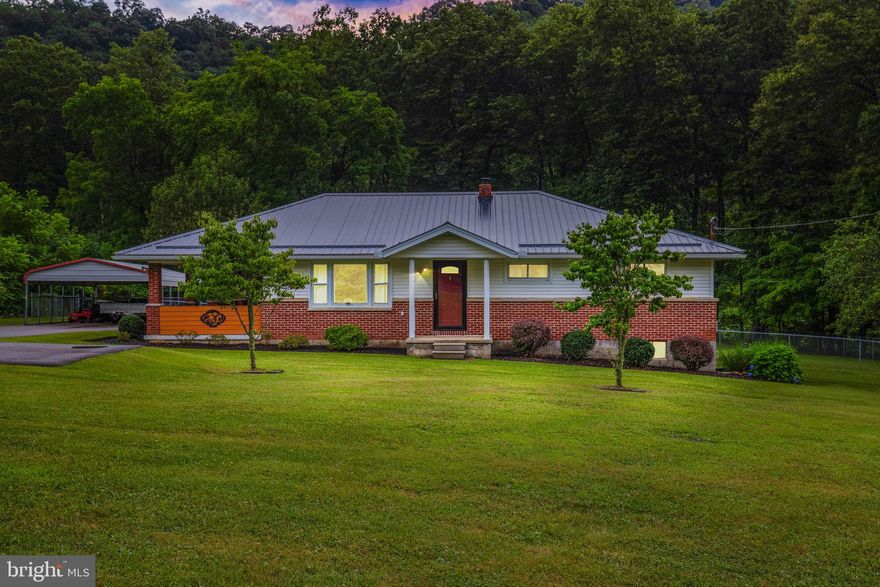 Fabulous rancher sitting on 3.7 acres and a stream!  Tucked in off of Vale Summit, this 3 Bd 1 Ba home has been completely cared for and renovated!  Beautiful oak hardwood floors throughout the living an bedrooms, the kitchen has updates throughout!  Full basement to house your storage and walks out to the fenced in back yard with large storage shed.  Travel out the back towards the woods to find a roaring creek and a stillness that only mother nature can provide!  Private setting for a campfire and plenty of space for garden or other outdoor activities.