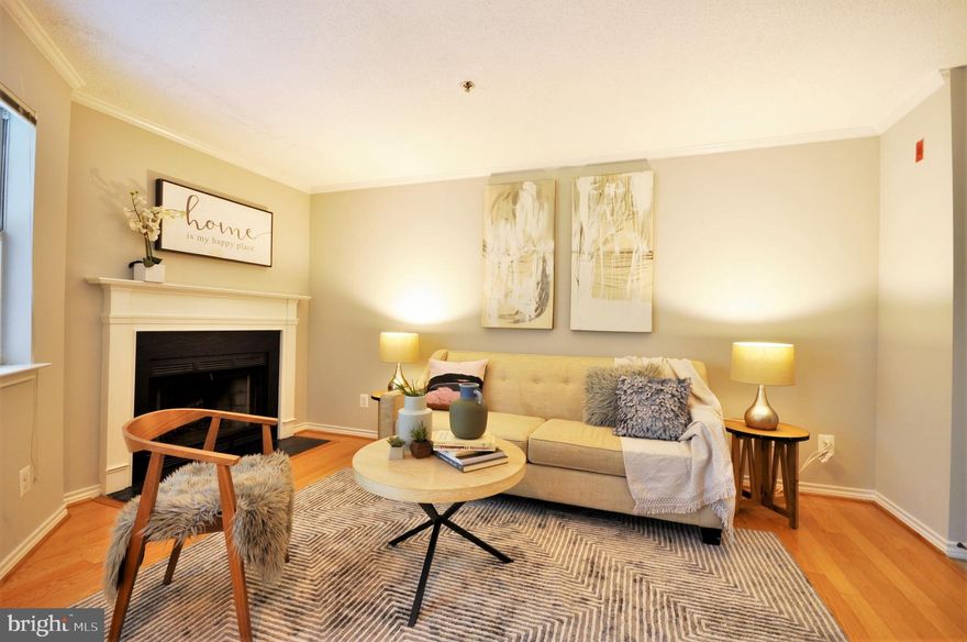 Take the elevator up to your top-floor, garden-view condo in Tysons that's less than 1 mile away to the Spring Hill Station Metro stop! Super convenient to work and within walking distance to a 24 hour Harris Teeter grocery store! Wood floors throughout the unit. Kitchen has updates and unit also offers a balcony, wood-burning fireplace, and in-unit washer and dryer! Great amenities for a low condo fee: pool, hot tub, sauna, gym, clubhouse that is rentable by owners/tenants all day for private parties for  $250 all day. 2 parking spots: 1 garage spot and 1 guest permit.