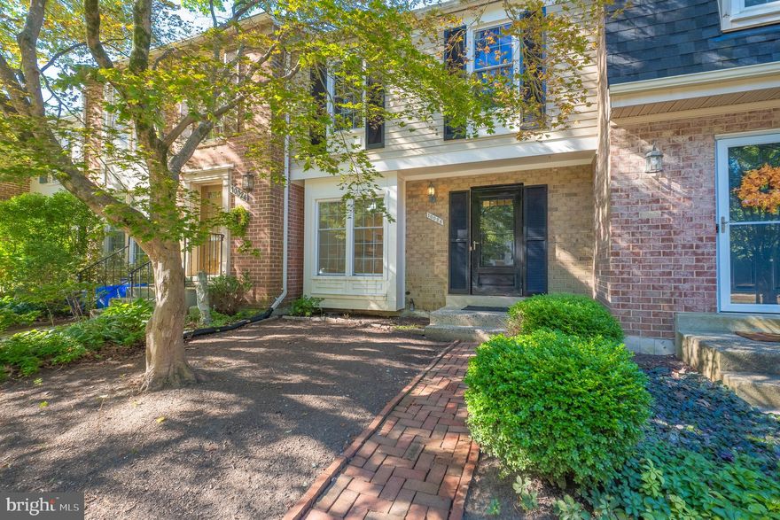 Imagine starting your mornings with sunlight pouring into your home and ending your days with a quiet moment on your deck, surrounded by trees and privacy. This bright, move-in ready townhome in Gaithersburg/Montgomery Village gives you all the space, updates, and convenience you’ve been searching for.
Inside, the main level flows effortlessly with hardwood floors and an updated kitchen that pairs crisp white cabinetry, sleek counters, and matching appliances for a clean, modern look. The living room opens directly to the deck—perfect for sipping coffee, hosting friends, or simply soaking in the wooded views.
Upstairs, you’ll find three comfortable bedrooms filled with natural light, including a primary suite with its own renovated bathroom. The lower level adds flexible space with recessed lighting, a half bath, laundry, and a walkout to the patio that blends into open, tree-lined surroundings.
Recent updates like the new roof, windows, and renovated bathrooms mean less stress and more time to enjoy your new home. Add in two reserved parking spaces and a location that keeps you close to shopping, dining, commuter routes, and parks—you’ve got the lifestyle you’ve been waiting for.
