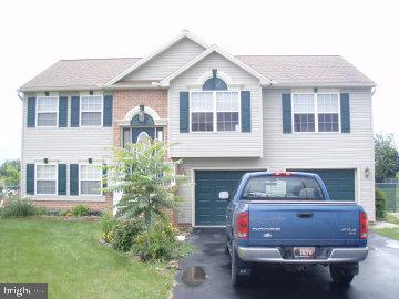 Split level home w/ 2 car garage on just over an acre in Littlestown. Being sold "as is". Seller will do no repairs.
