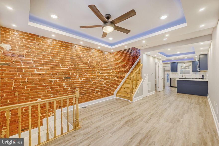 GREAT DEAL - MOTIVATED SELLER. PRICE REDUCTION & SELLER OFFERING $7,500.00 TOWARDS BUYER'S CLOSING COSTS. Seller rented bedrooms at $1,100 per room. Each bedroom and basement have their own separate entrance and full bathroom. Great price and concession for turn key asset.

 Welcome to 703 N Port Street, a beautifully renovated contemporary row home offering stylish city living just minutes from Johns Hopkins Hospital. This 3-bedroom, 3 and ½ bath home blends modern design, thoughtful functionality, and quality finishes in one of Baltimore’s great neighborhoods. The open concept main level features LVP, exposed brick walls, upgraded lighting, and a bright living and dining area that flows seamlessly into the gourmet kitchen—perfect for everyday living and entertaining. The kitchen is outfitted with quartz countertops, sleek royal blue cabinetry, and stainless-steel appliances. Upstairs, two spacious bedrooms each offer private en-suite baths. The lower level provides ample entertainment space with its own 3rd bedroom and en-suite. Step outside to enjoy a private rear patio and the rare convenience of off-street parking with a dedicated parking pad. This home even has the potential to purchase the side lot from Baltimore. A few blocks north of Patterson Park and minutes from JHH, and popular neighborhood cafés and shops, this move-in-ready home delivers modern comfort, convenience, and excellent proximity to major city amenities. Come take a look.
