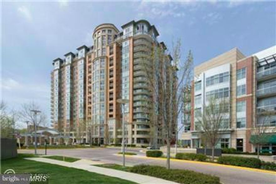 JUST MOVE IN WITH BAGS, FULLY FURNISHED WITH MODERN FURNITURE. END UNIT WITH CIRCLE BALCONY.  DEN CAN BE USED AS 3RD BEDROOM. DESIGNER PAINT,  2 TELEVISIONS. LARGE KITCHEN WITH STAINLESS STEEL APPLIANCES HARWOOD FLOORS, MODER BATHROOMS.  CAN BE RENTED UNFURNISHED, WITH 2 YEAR LEASE. ROOF TOP POOL, GYM,CONFERENCE ROOM ,WALK TO TYSONS 2.