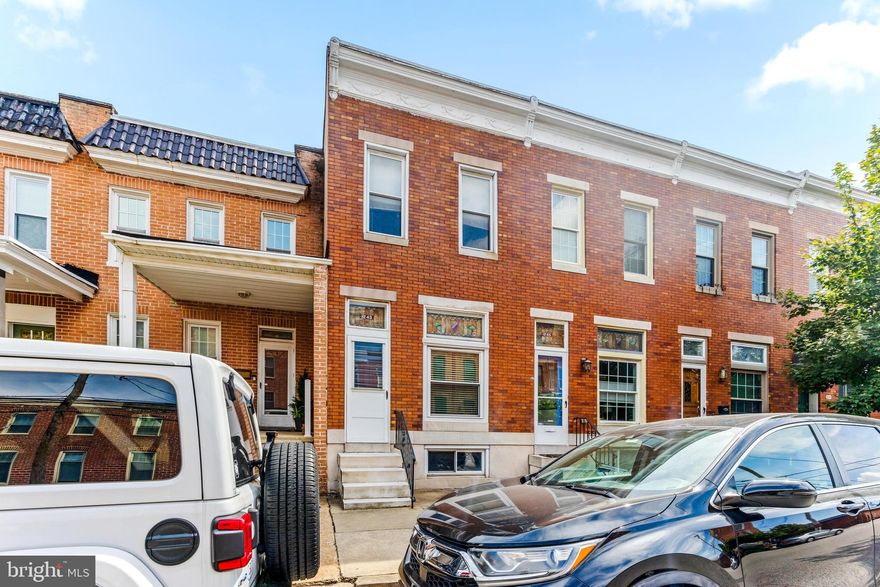 Located in the heart of Locust Point, 1243 Hull St offers a large footprint at an affordable price! Featuring a fully finished basement, open floor plan and parking , this 2bd/2.5 bath historic rowhome checks every box on a buyer's wish list! The main level is spacious and open and offers hardwood floors throughout. The living/dining room combo opens nicely to the Brand new kitchen, which provides quartz countertops, stainless steel appliances and plenty of cabinet space. There's also a renovated powder room and oversized pantry for added convenience and access to  a private parking pad.  Upstairs offers 2 bedrooms one with  a guest bathroom with shower/tub combo. The primary suite is  large and can easily fit a king-sized bed, plus has access to the 2nd full bathroom. The basement is fully finished and provides ample storage space and a bonus room for entertaining guests, use as a home office or a home gym.,  This Locust Point home is truly turnkey and is ready for its next owner!