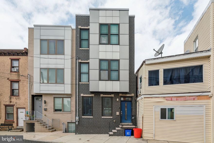 Step into your dream home in the heart of Fishtown! This beautiful 6-year-old residence, still benefiting from several years of a 10-year tax abatement, offers the perfect blend of modern luxury and timeless charm. The expansive kitchen is a true standout, with its upgraded cabinets, gleaming stainless steel appliances, and stunning granite countertops, making it a culinary haven for any chef. The first floor boasts a generous open layout, featuring both a cozy family room and a spacious living room—ideal for hosting gatherings or simply relaxing in style. Head upstairs to find roomy bedrooms with elegant hardwood floors that add a touch of sophistication. The finished basement, complete with a full bathroom, offers versatile space for your needs. Don’t miss the rooftop deck, where you can unwind while enjoying breathtaking city skyline views. Plus, with this home being 19 feet wide—two feet more than most Fishtown rowhomes—you’ll have extra space for your larger furniture and personal touches. And the cherry on top? Ample free street parking right outside.  Home has recently had painting, professional cleaning, HVAC serviced and a new door leading to the rooftop deck.  This exceptional property in a sought-after neighborhood is a must-see—come make it yours today!