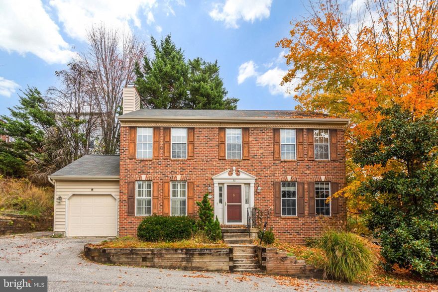 Come home to this lovely Colonial with 4 Bedrooms,  3.5 baths and a spacious, well planned 2,450 square feet of Living Space. Gleaming hardwood floors flow throughout the Main Level, along with 9ft ceilings and impressive finishing details. Main Level features a Living Room, Dining Room, huge Kitchen with Breakfast Room & access to rear deck and Laundry Room. Off the Kitchen is a spectacular Family Room with custom Built-ins and cozy wood burning fireplace. The Upper Level sleeping quarters are all generously sized to include a Primary Suite w/ Vaulted Ceiling, built in shelves, Walk-in closet and Luxury En-suite Full Bath. Additionally on this level you will find 3 more Bedrooms and hallway Full Bath. The Finished and freshly painted sprawling Lower-Level hosts a Full Bath, Storage and Utility room with shelving and enough space for a second Family Room and Game Room. Venture outdoors  to enjoy relaxing in this quiet and private Community or entertaining on the rear deck with views of mature trees and landscape. Conveniently located close to I-83 & I-695, Hunt Valley, shopping, dining, entertainment and Blue Ribbon Schools. Do not hesitate...this lovely brick front Colonial will go fast! Meeds a little TLC BUT priced $75,000 to $100,000 below fair marekt value ...  Put in a little elbow grease and reap the rewards !!!    Schedule your showing today!