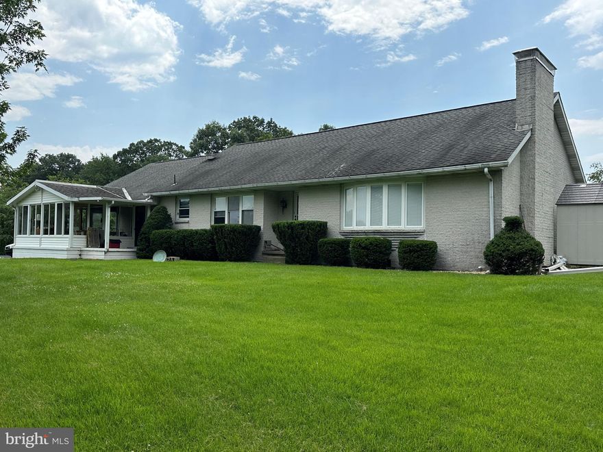 Beautiful secluded property on 1.97 Acres country setting.  There is a sunroom, fireplace in living room great for one floor living.  There is a huge basement with a fireplace just waiting for your finishing touches.  There is also a lot of potential to create your master bedroom suite on the 2nd level.