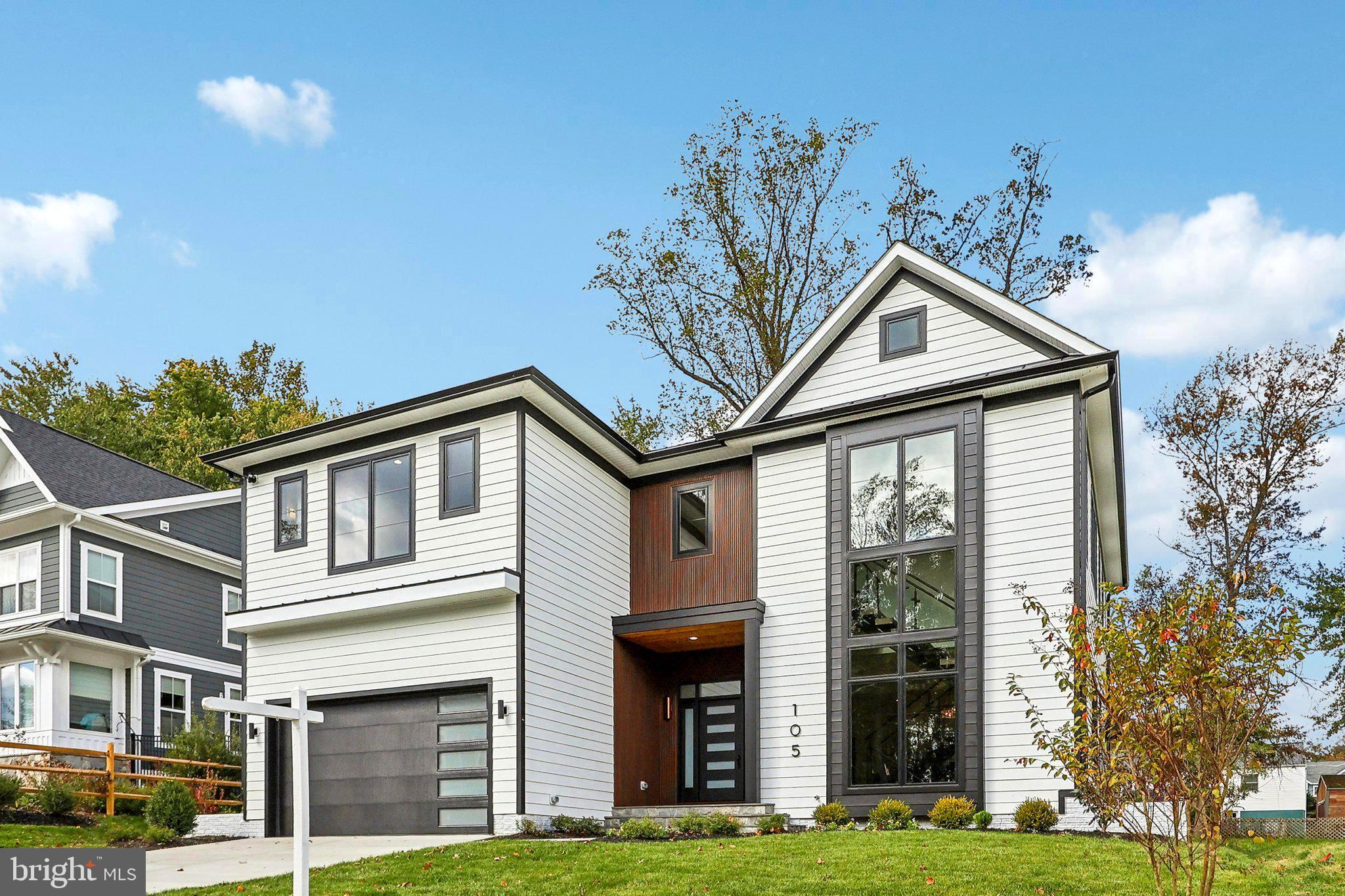 READY TO MOVE IN!!!
Luxurious 5,000+ Sq. Ft. Home in Vienna's Most Desired Neighborhood.
Discover this breathtaking, modern masterpiece just minutes from Tysons Corner, boasting over 5,000 square feet of sophisticated living space, this home is designed with impeccable taste and high-end finishes throughout. Step into an elegant, open-concept layout featuring black-framed windows, floating glass-railed stairs, and wood wall panels that add a touch of modern warmth. No expense was spared in creating this house, down to every last detail.
With 5 bedrooms and a main-level office—which can easily be converted into a 6th bedroom thanks to its attached full bathroom—this home is both spacious and versatile.
The gourmet kitchen is a chef's dream, showcasing high exotic quartzite countertops and Italian luxury tiles, complemented by top-of-the-line appliances. Enjoy seamless indoor-outdoor living with a screened porch and deck, perfect for entertaining. Relax in the living area with a striking electric fireplace, adding a sleek and sophisticated ambiance to the home.
The fully finished basement is an entertainer’s dream, featuring a sleek, contemporary wet bar with unique chandeliers and ample open space, allowing you to customize and create your dream environment.
Situated in a highly sought-after Vienna neighborhood, this home also includes a 2-car garage and is just minutes away from Tysons Corner. Every detail of this home has been thoughtfully designed, creating a luxurious living experience for its future owner.
Buyers may be eligible to receive a credit up to $6,000 when financing their purchase through the seller's preferred lender. This offer is subject to terms and conditions, and certain restrictions may apply.
Ready to elevate your lifestyle? Reach out today!