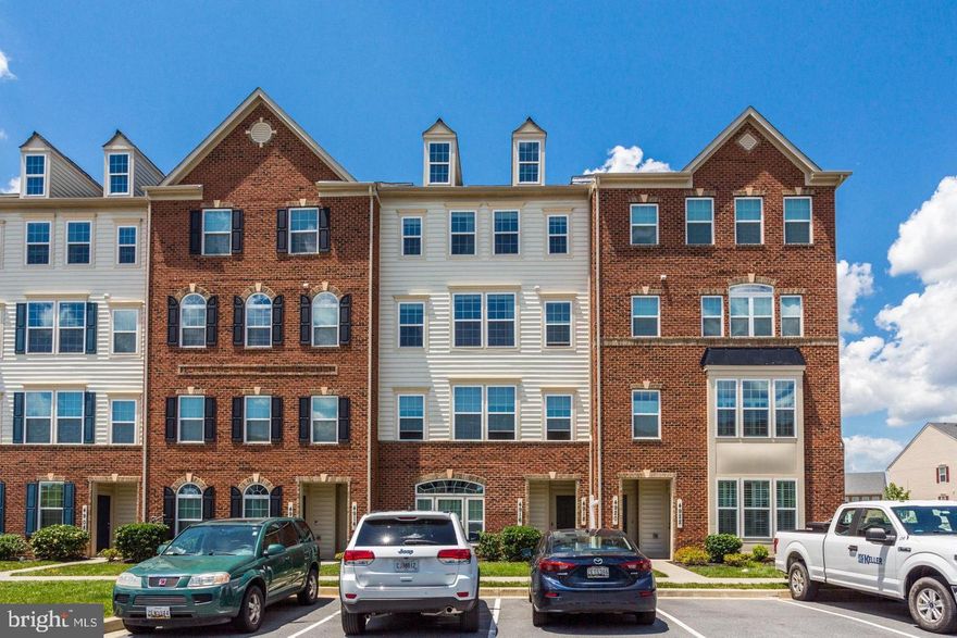 Come home to this fabulous 3 Bedroom, 2.5 Bathroom Top Level Townhouse Unit. Entry-Level has a Foyer, inside access to the 1 car garage and newly carpeted staircase. Main Level is bright, open and spacious with 9 ft ceilings and hardwood floors throughout. Also on this level is a Living Room, huge Gourmet Kitchen with an Island, granite countertops with coordinating backsplash, 4 burner gas cooking and access to the rear balcony. The Kitchen opens to a large Family Room with a cozy gas fireplace and a dining area. Upper-Level Primary Suite with Tray Ceiling, Sitting Room, 2 huge walk-in closets and En-Suite Bathroom with 2 vanities, separate water closet and enormous luxury shower. Also on this level are 2 more spacious Bedrooms, Laundry Room and Full Bathroom. Enjoy the numerous Community Amenities such as the Fitness Center, Clubhouse, and Community Swimming Pool and much more! All of this plus the convenience of being located minutes to major commuter routes such as I-270/I-70 and Rt. 15. Also minutes away from the Westview Park Promenade featuring retail, restaurants and movie theater. Don't miss out on this amazing opportunity...schedule your showing today