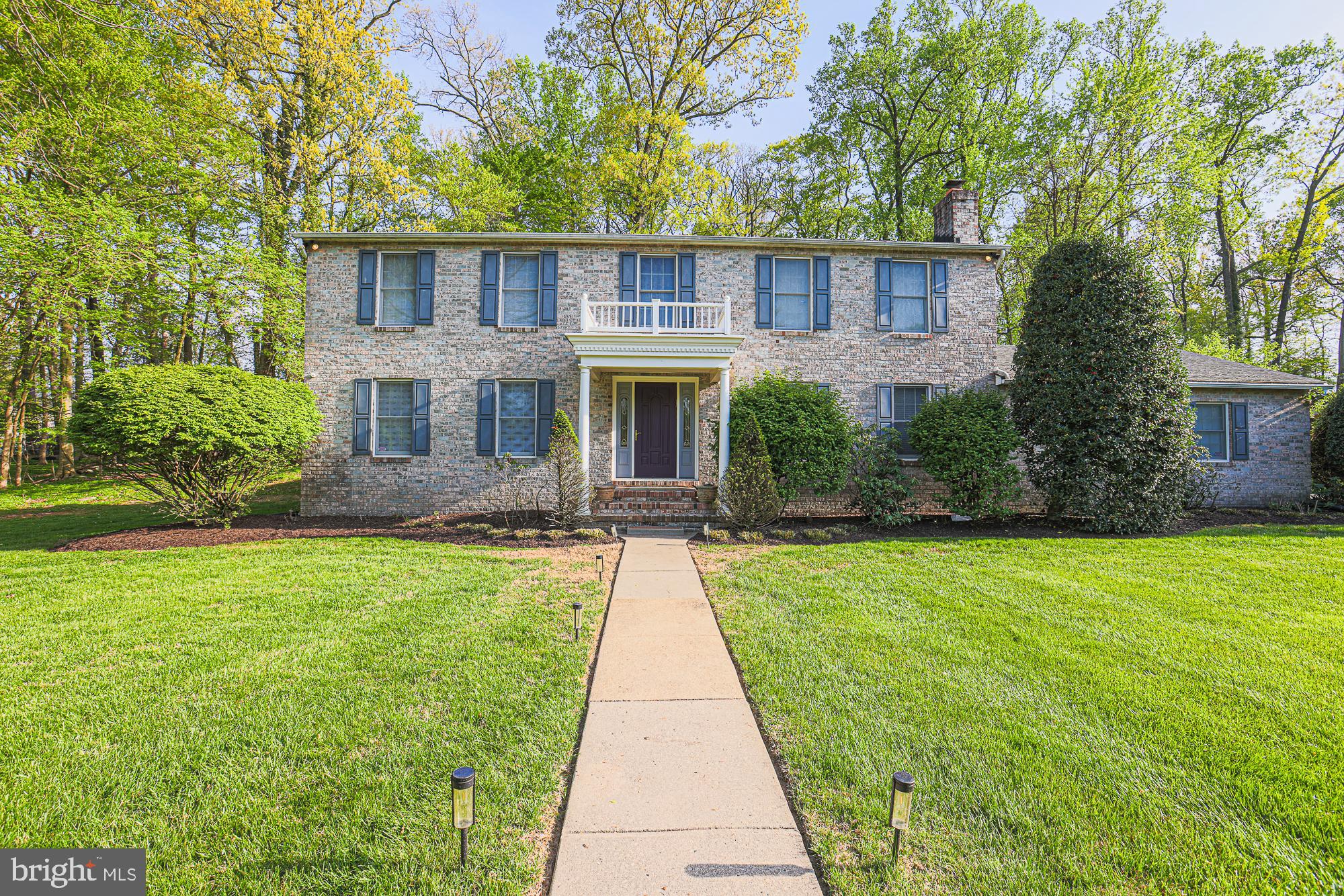 Meticulously maintained and thoughtfully updated, this spacious 6-bedroom, 4-bath Colonial offers timeless style and modern versatility. The main level welcomes you with a spacious living room and formal dining room, ideal for entertaining or everyday comfort. The recently remodeled gourmet kitchen features quartz countertops, stainless steel appliances, and ample cabinetry. Also on the main floor: a cozy family room, a private office with exterior entrance, a two-bedroom guest/in-law suite with full bath, and an accessible full bathroom.
Upstairs, the luxurious primary suite features two walk-in closets and a private sitting area, along with three additional bedrooms and another full bath. The finished lower level offers a large recreation room and generous storage space, ideal for hobbies, entertainment, or a home gym.
Step outside to a well-manicured yard and enjoy the seasons from the huge screened-in porch — perfect for relaxing, dining, or entertaining outdoors in comfort. A covered carport provides protected off-street parking year-round.
Set in a desirable neighborhood on a huge lot and with versatile living spaces, thoughtful upgrades, and multigenerational potential, this home is a rare opportunity that delivers comfort, function, and value in one exceptional package.
Note - Square footage on tax record is incorrect.