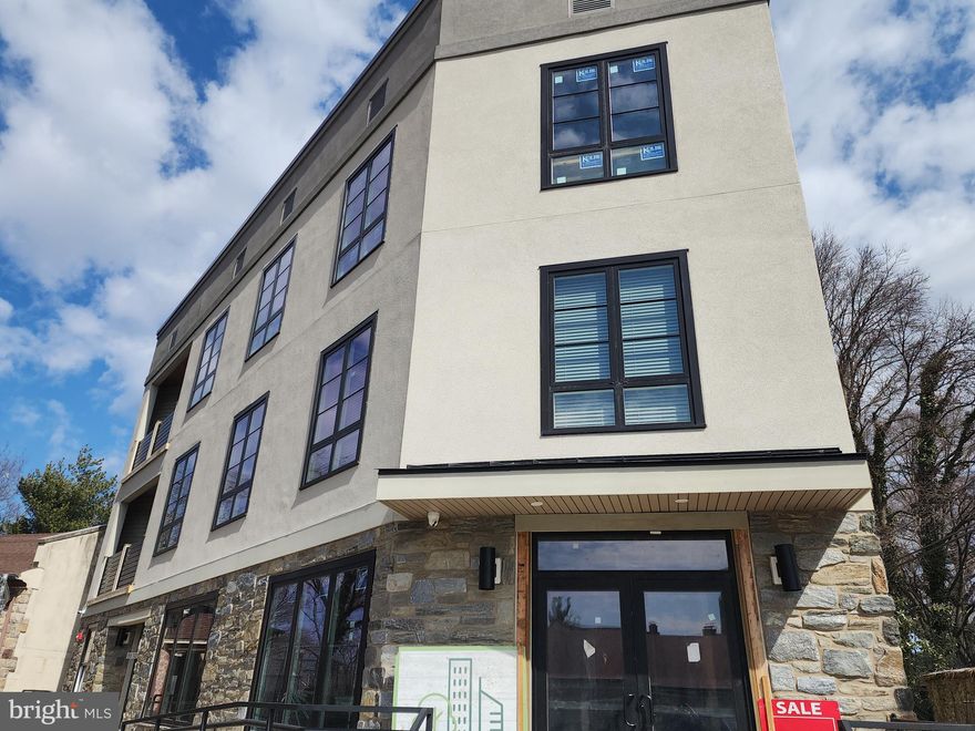 Quick delivery ! Just 3 residences left! Evergreen Place - A " Boutique Condominium"   This is the one that you have been waiting for. At the Top of the Hill 9 very unique new construction residences. Offering a maintenance-free lifestyle in the heart of vibrant Chestnut Hill, just a short stroll to both train stations for an easy commute to Center City. Just outside your front door at Evergreen Place , everything is at your fingertips but without the noise of Germantown Ave! Terrific shopping, dining and a short jog to plenty of parks  ! These tastefully designed homes include the finest finishes, where you'll welcome friends and guests. This very convenient first floor  bi-level home  is approximately 1910 square feet and features 9 foot ceilings and  2 or possibly 3  bedrooms and 2 1/2 baths plus large family room and living room with hardwood flooring and has a gourmet kitchen with a Wolf/ Sub-Zero appliance package with green energy efficient induction cooktops, built-in wall-oven/microwave and more!  Other features include high end Kolbe Windows, on site parking , tax abatement, elevator , all in a pet friendly building with security system. Elevator runs from lower level to 3rd floor.Photos are of finished unit 202 with similar kitchen and baths. Buyer can customize floor plan and finishes with completion in 60-90 days. Owner is a PA licensed Real Estate Broker.