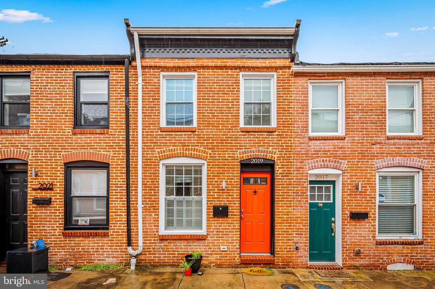 I just love this little cream puff! She looks small from the outside but inside she is mighty beyond her years. Tucked away in the heart of everything in Fells Point is Portugal Street. This is the perfect home for the pickiest of buyers. Top notch renovation in 2018 with very high quality finishes she hasn’t aged a day. 

The main level has a sweet living room that opens to a massive chef’s kitchen with plenty of space for a dining table to host lavish dinners for family and friends. Enjoy gorgeous Quartz countertops, stainless steel Whirlpool appliances, more cabinet space than you could dream of, and a hood that actually exhausts to the outside. Just off the kitchen is a private covered patio for dining alfresco. The second floor has a bedroom in the front with a large primary bedroom and bath in the back with a new private Trex deck. The lower level has a possible third bedroom for guests, or use it as an office or exercise room. There is also a full bath and stackable laundry located here too. Nothing will disappoint you in this sweet home.

The current owner loves this location because everything is easily walkable! Patterson Park, Saturday Farmers Market, award winning restaurants including a few of my favorites like Thames Street Oyster House, The Wren, Little Donnas and an old favorite Peter’s Inn. Local shopping within steps of your new home. Hyper convenient to Johns Hopkins Hospital, Shuttle to Bayview and Homewood Campus, and major roadways and public transportation to help make your daily commute as easy as possible. Love city life in one of Baltimore’s most well loved neighborhoods, Fells Point!