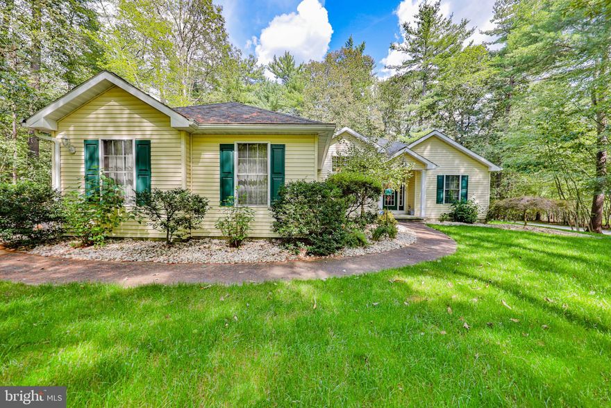 WRAP THIS HOME UP JUST IN TIME FOR THE UPCOMING HOLIDAYS! PEACEFUL, PRIVATE, & TRANQUIL . . describes the setting of this 3-BR, 2-BA contemporary ranch home nestled on a partially wooded corner 1.01 acres in the "NO DUES" community of Saw Mill Run. The open floor plan, spacious rooms, together with the high and vaulted ceilings allow you to move freely throughout the home adding to a sense of freedom and comfort. Landscaped gardens, rolling greens, and stately shade trees truly makes this a family home! Minutes to Beltzville Lake, Blue Mtn. Ski, Penn’s Peak, and convenient to the PA Turnpike for easy commuting to the Lehigh Valley or NYC. SHOWN WITH PRIDE!PEACEFUL, PRIVATE, & TRANQUIL . . describes the setting of this 3-BR, 2-BA contemporary ranch home nestled on a partially wooded corner 1.01 acres in the "NO DUES" community of Saw Mill Run. The open floor plan, spacious rooms, together with the high and vaulted ceilings allow you to move freely throughout the home adding to a sense of freedom and comfort. The casual/formal living room features wood floors, 11' vaulted ceilings, a propane fireplace nestled between large windows that flood the home with natural light! The formal open dining area and breakfast area are perfect for small or large family traditions. The spacious master suite features a tray ceiling, wood floors, (6' x 7') WIC, bathroom with double vanity, tiled shower, tiled floors and a relaxing 2-person Jacuzzi. Meticulously Maintained! There's also heated floors in the kitchen, hallway, and master bathroom! A rear wood deck (15' x 30') spans across the rear of the home, perfect for grilling, relaxing and enjoying the peace and privacy! Full unfinished basement, central vacuum, 2-car attached garage, electric panel set up for portable generator, and a (10' x 8') detached shed are just a few of the many extras and upgrades this home offers. Landscaped gardens, rolling greens, and stately shade trees truly makes this a family home! Minutes to Beltzville Lake, Blue Mtn. Ski, Penn’s Peak, and convenient to the PA Turnpike for easy commuting to the Lehigh Valley or NYC.  SHOWN WITH PRIDE!