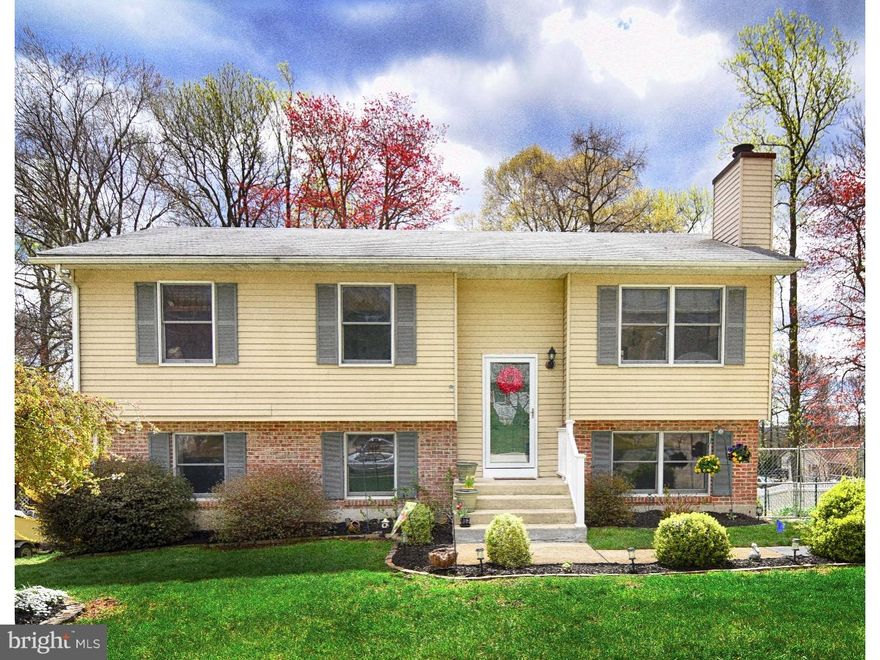 Welcome to 329 E. Village Road in Buckhill Farms! Close to everything you need, with upgrades galore. Let's start on the first floor with beautiful hardwood floors. The spacious living room is open with a marble, wood burning fireplace. Your dining area has plenty of room with tons of light. The kitchen has been updated with tile floors, new countertops, a beautiful back splash, white cabinets, stainless steel appliances, and for extra space a kitchen island. Back through the dining room is your extended deck perfect for entertaining with steps to a large backyard. The first floor is completed by three nice size bedrooms and a full bath. The lower level features a large family room also perfect for entertaining. Enjoy the open space with a propane burning fireplace and an outstanding bar area! One this level you also have a full bathroom, laundry room, plenty of storage and a workshop with walk out access to the backyard. All of the appliances are newer along with your ac/heater. Come check it out for yourself and schedule your showing today!