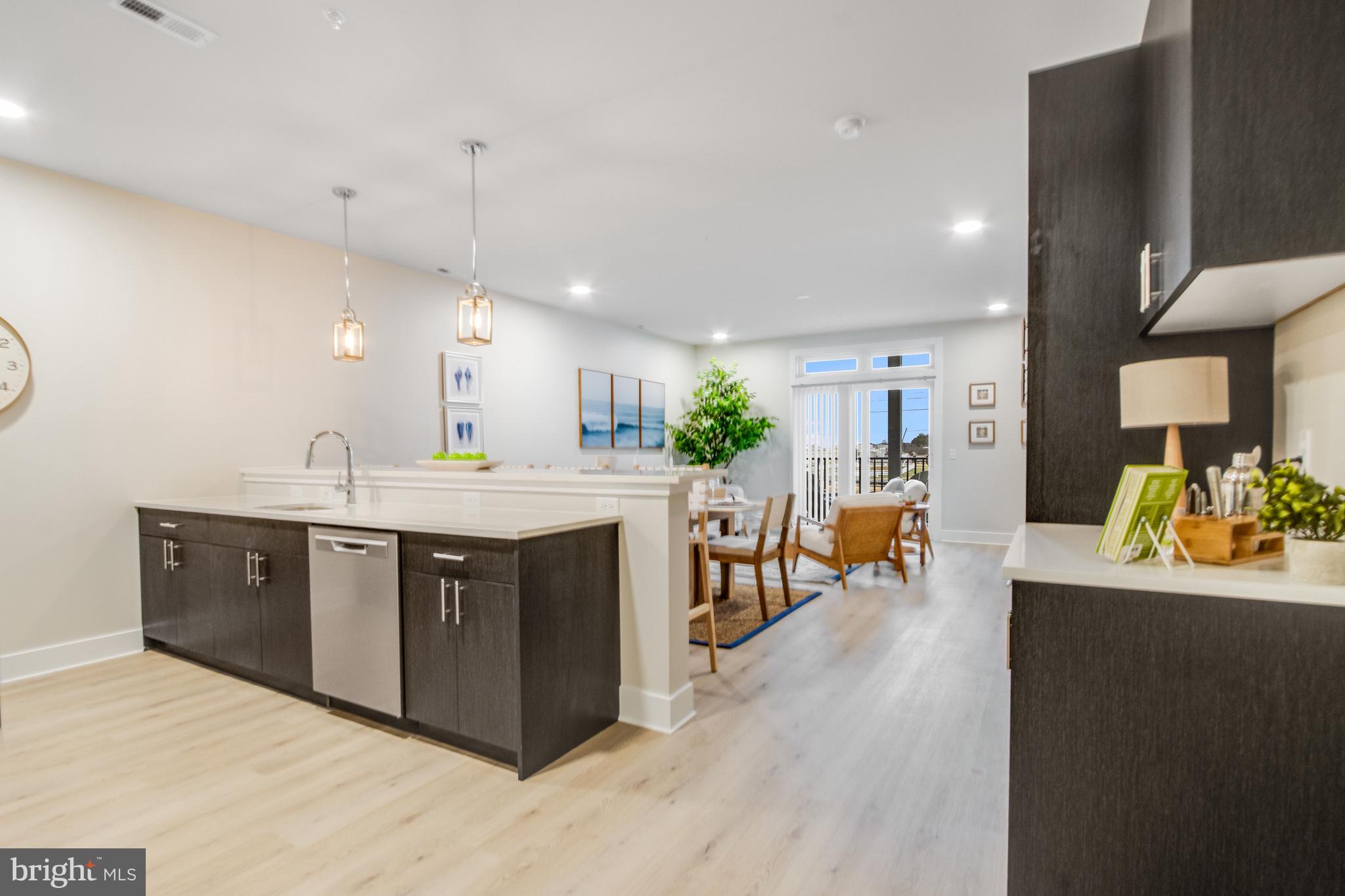 FLATS AT COASTAL STATION - Residential