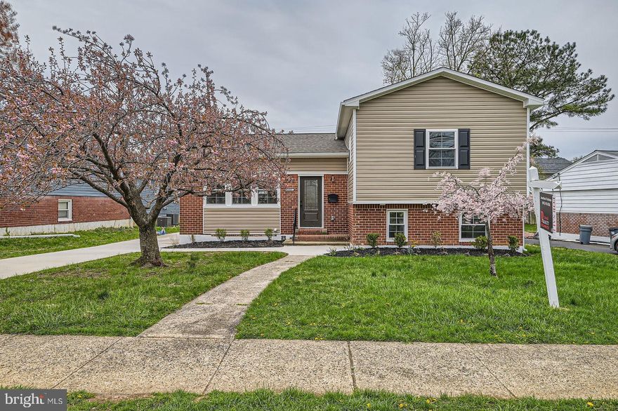 Stunning Renovation! This home has it all.  5 bedrooms and 4.5 baths including 2 master suites. Everything is new ! Kitchen with quartz counters, top of the line stainless steel appliances and 2 sinks.  New bathrooms, electrical, plumbing, windows, roof, Hvac, Deck. Open floor plan! Recessed lighting. Beautiful floors on all levels.  Finished basement with full bath. Move in Ready.