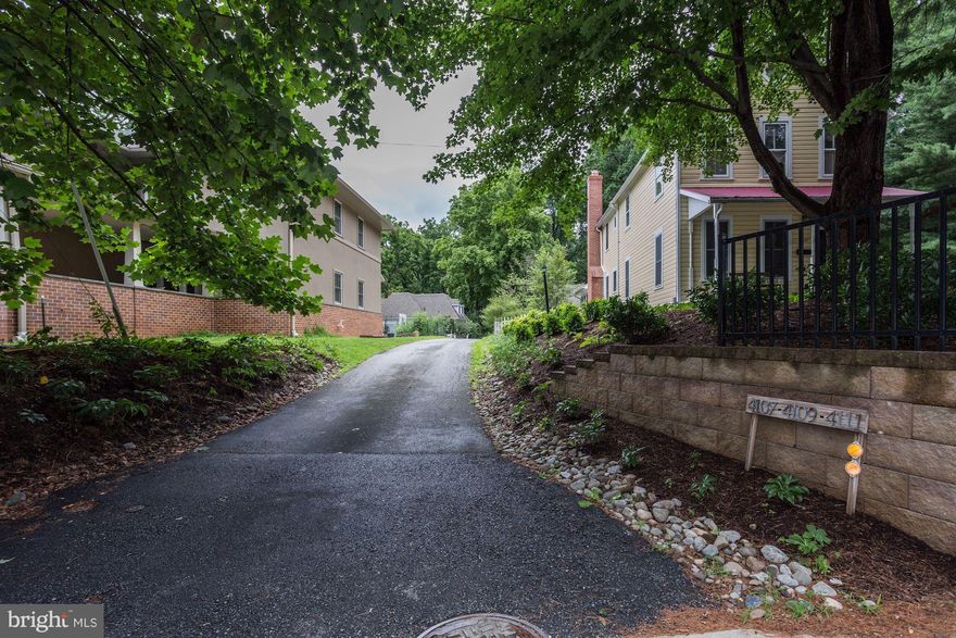 NOT ON JONES BRIDGE ROAD! BACKS TO PARKLAND! PRIVATE DRIVEWAY! Tucked away in wooded setting-beautiful custom house w 4BR/3.5BA w front porch, updated Kit w brkfst bar, eat-in area opens to Deck & yrd! LR w FP, sep DR, 1/2 BA, HWF! Mstr BR w 3 closets, en suite BA w tub, sep shower, skylights. Wlkout basemt w FR w FP, 4th BR, BA. Close to to Metro, Bethesda, Purple Line, restaurants, shopping.